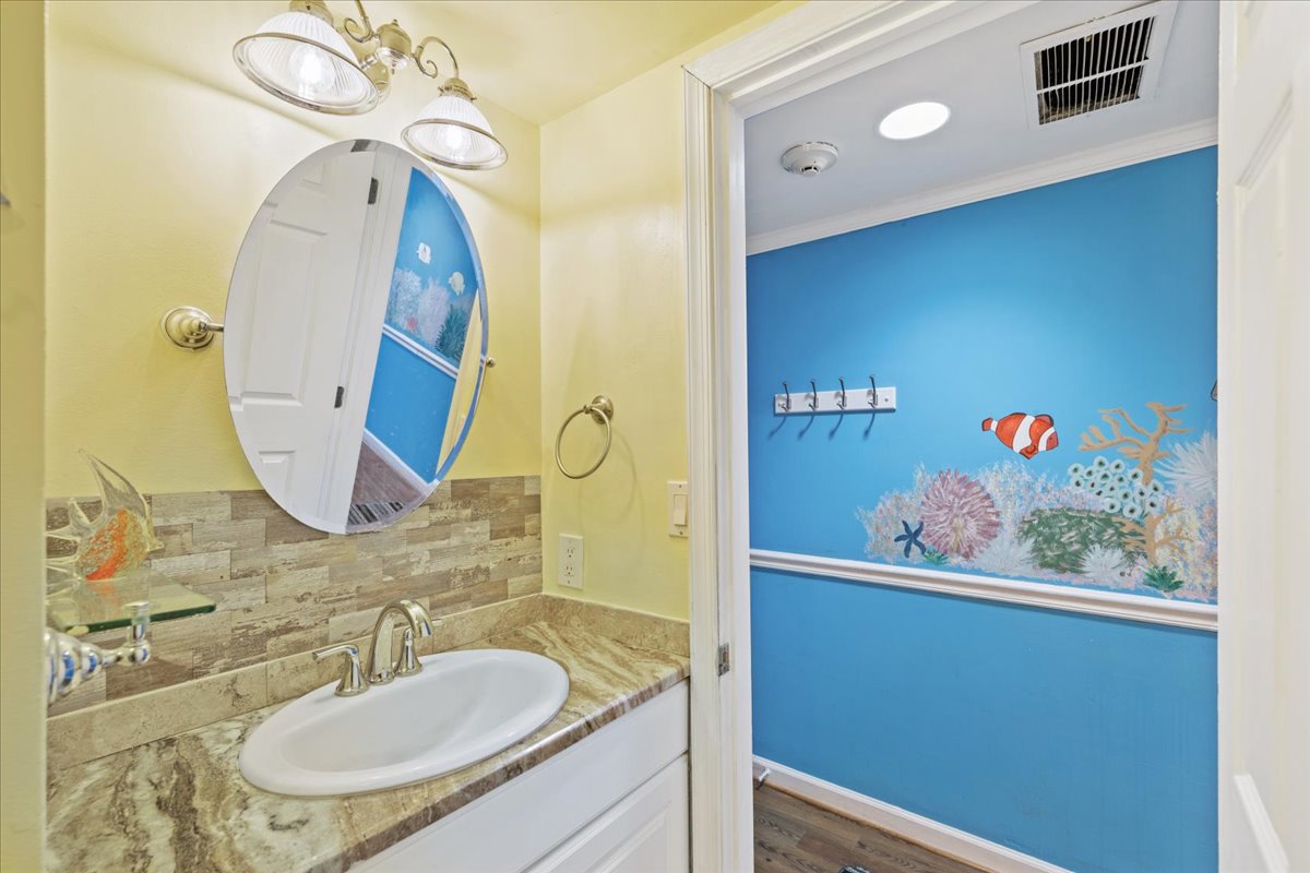 The Full Shared Bath is conveniently located in the Hall.