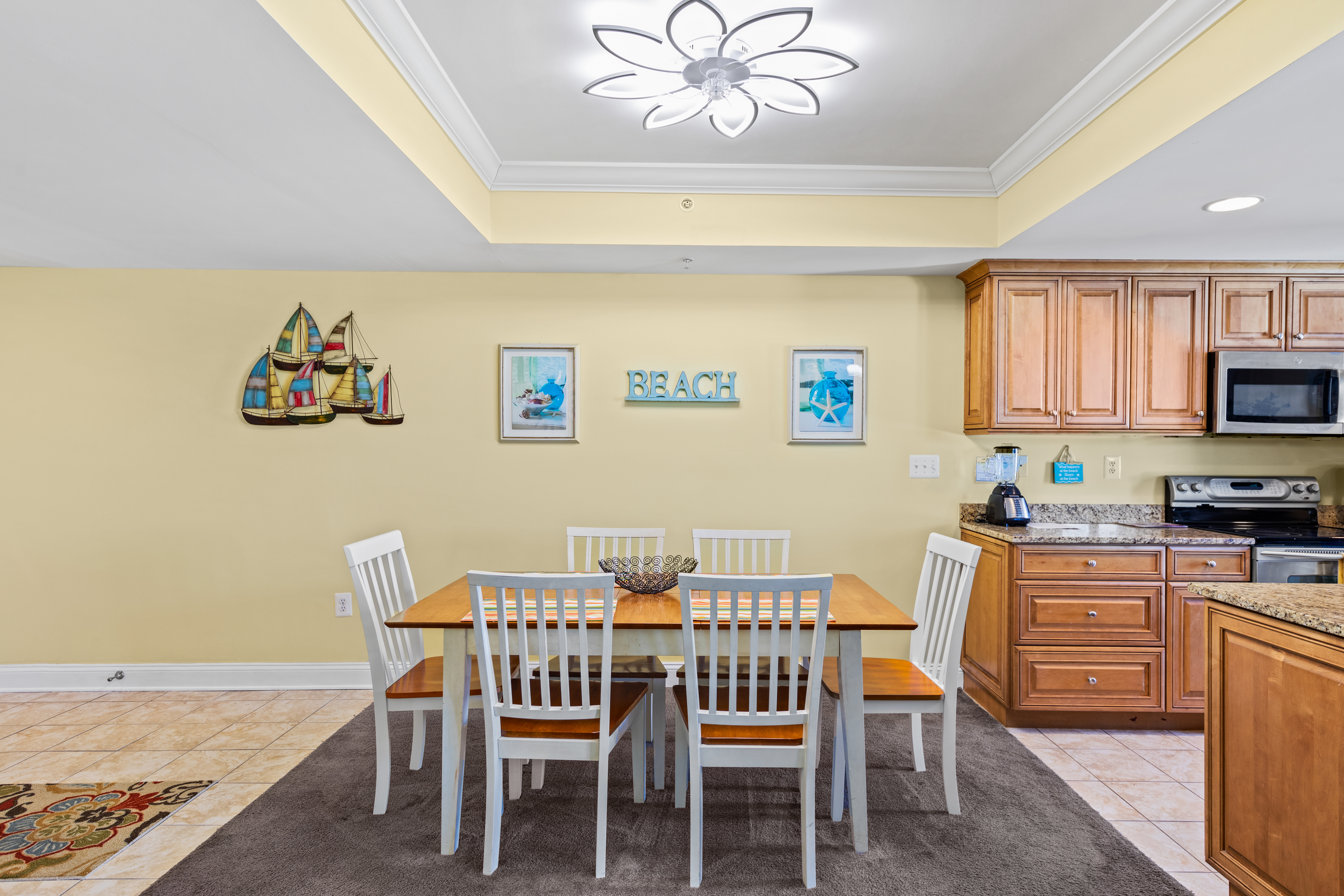 There is plenty of seating at the dining table for the whole family.