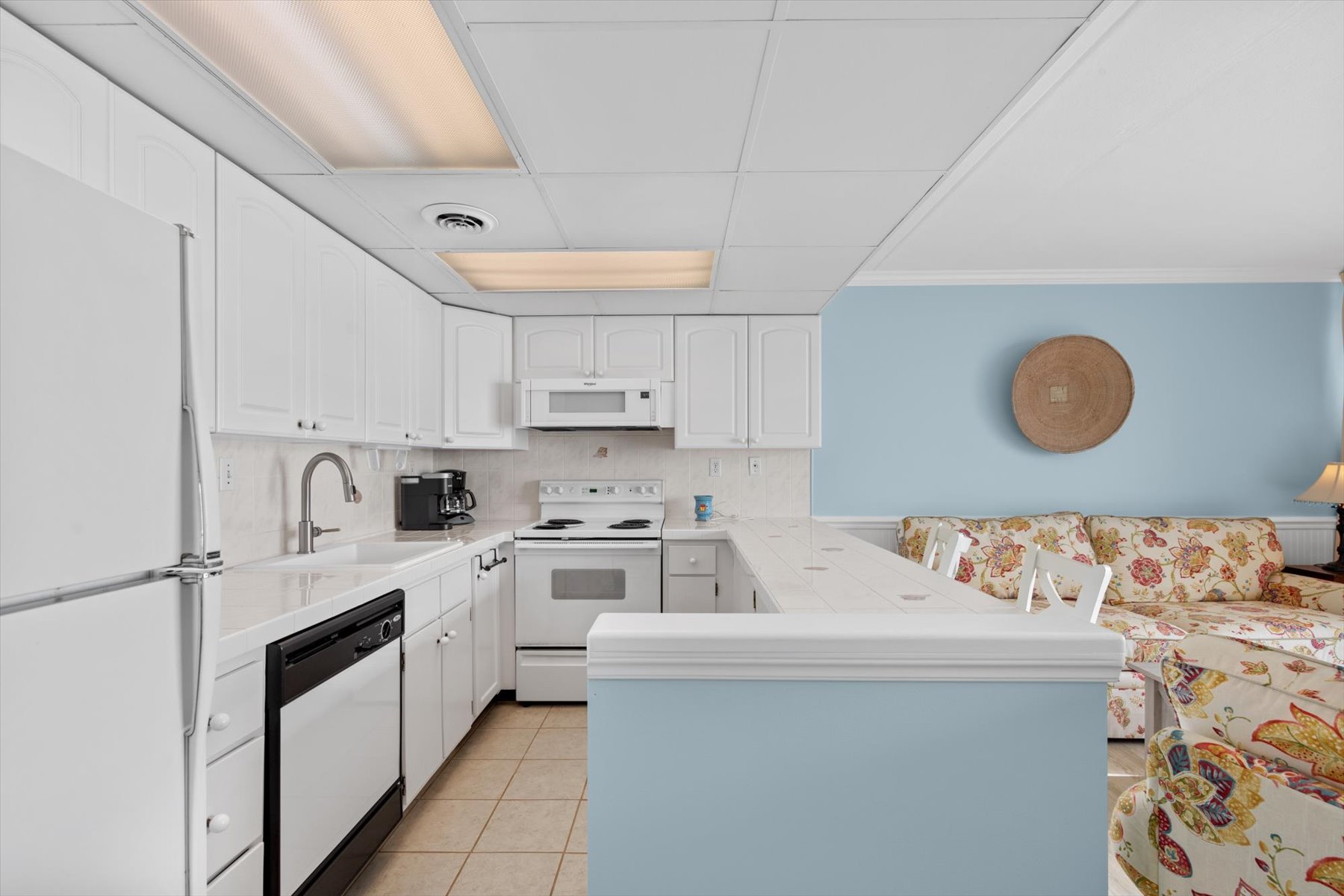 Open to the living area, you can whip up a meal without ever missing a moment of the fun