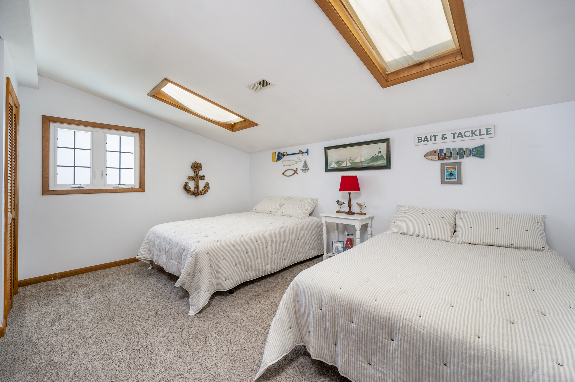 Bedroom 3 is upstairs and features 1 Queen and 1 Double Bed.