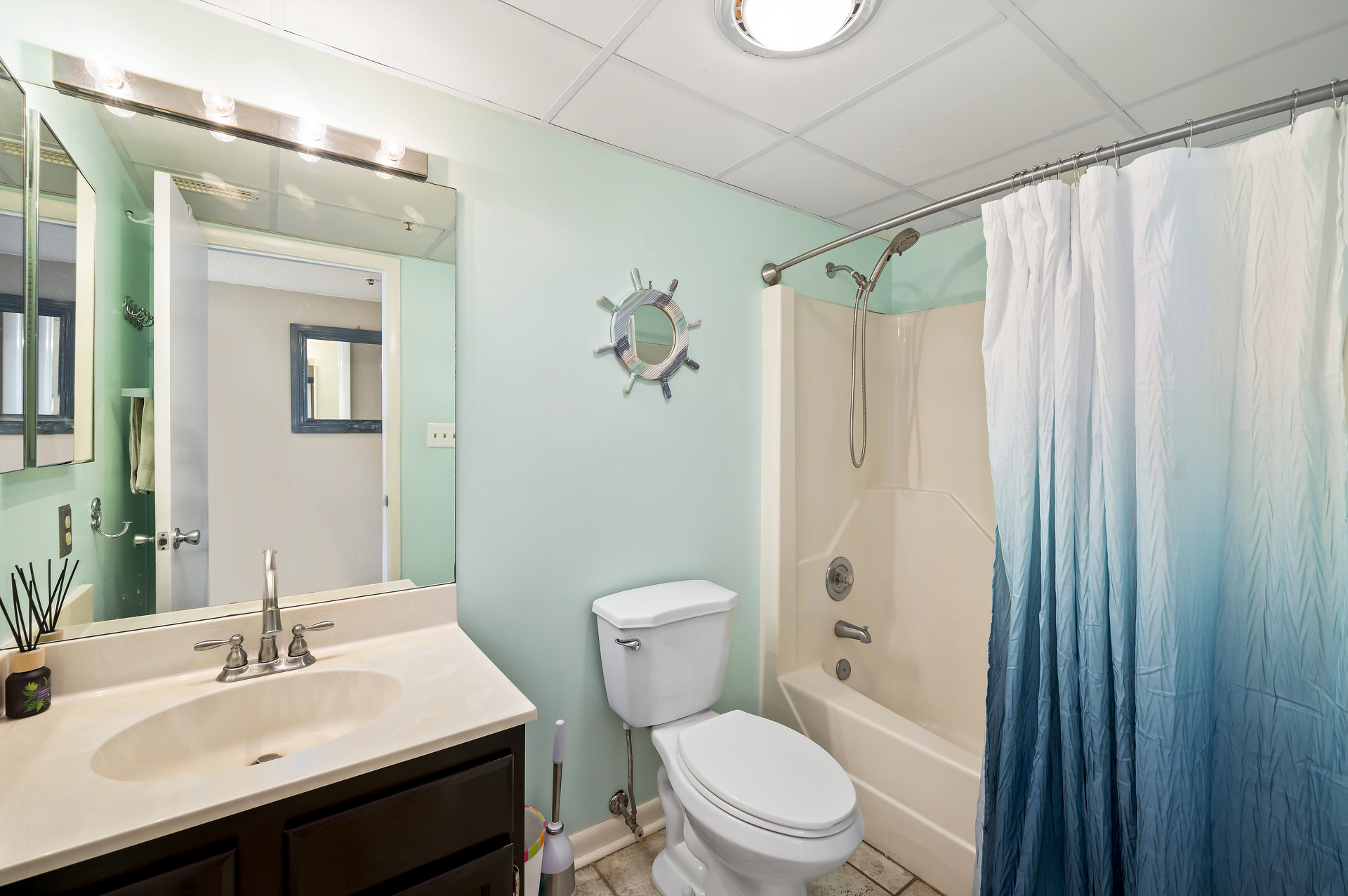 Spacious, Full Shared Bath with a Shower/Tub Combo.