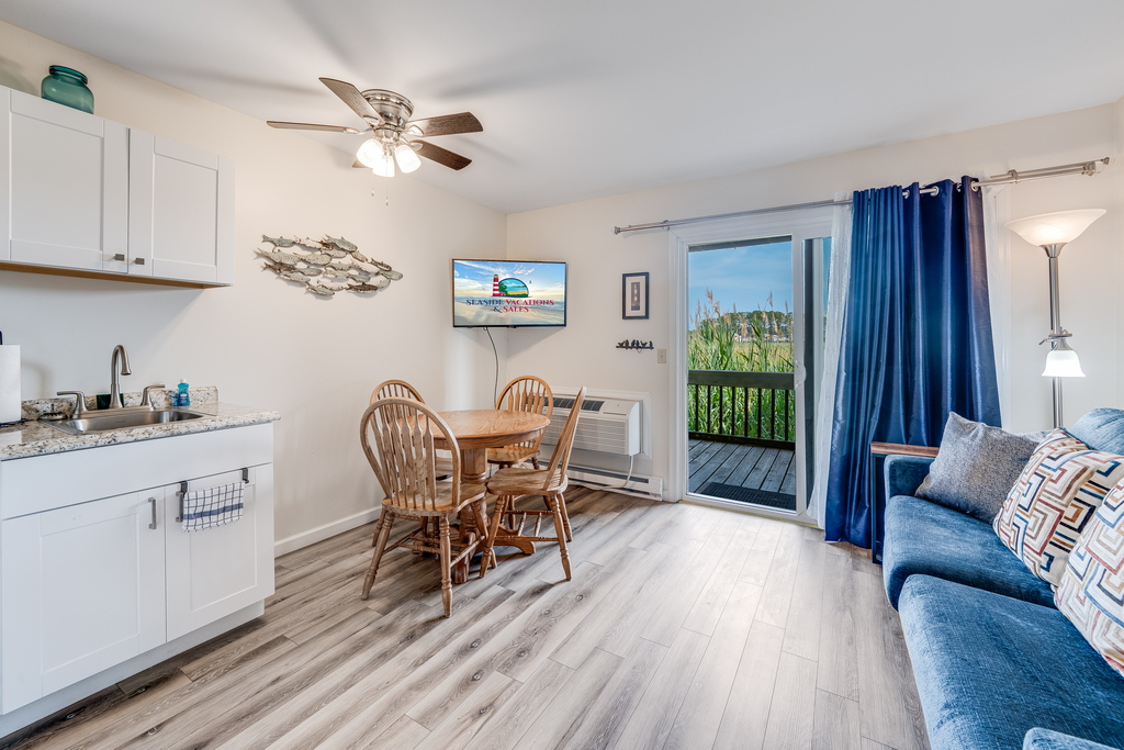 Beachy Floors, Flat Screen Cable TV, and more!
