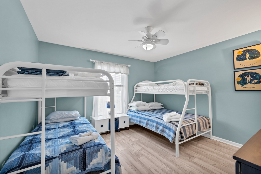 Bedroom 3 sleeps 5 in a Pyramid Bunk (Twin/Twin) and Twin Bunk.