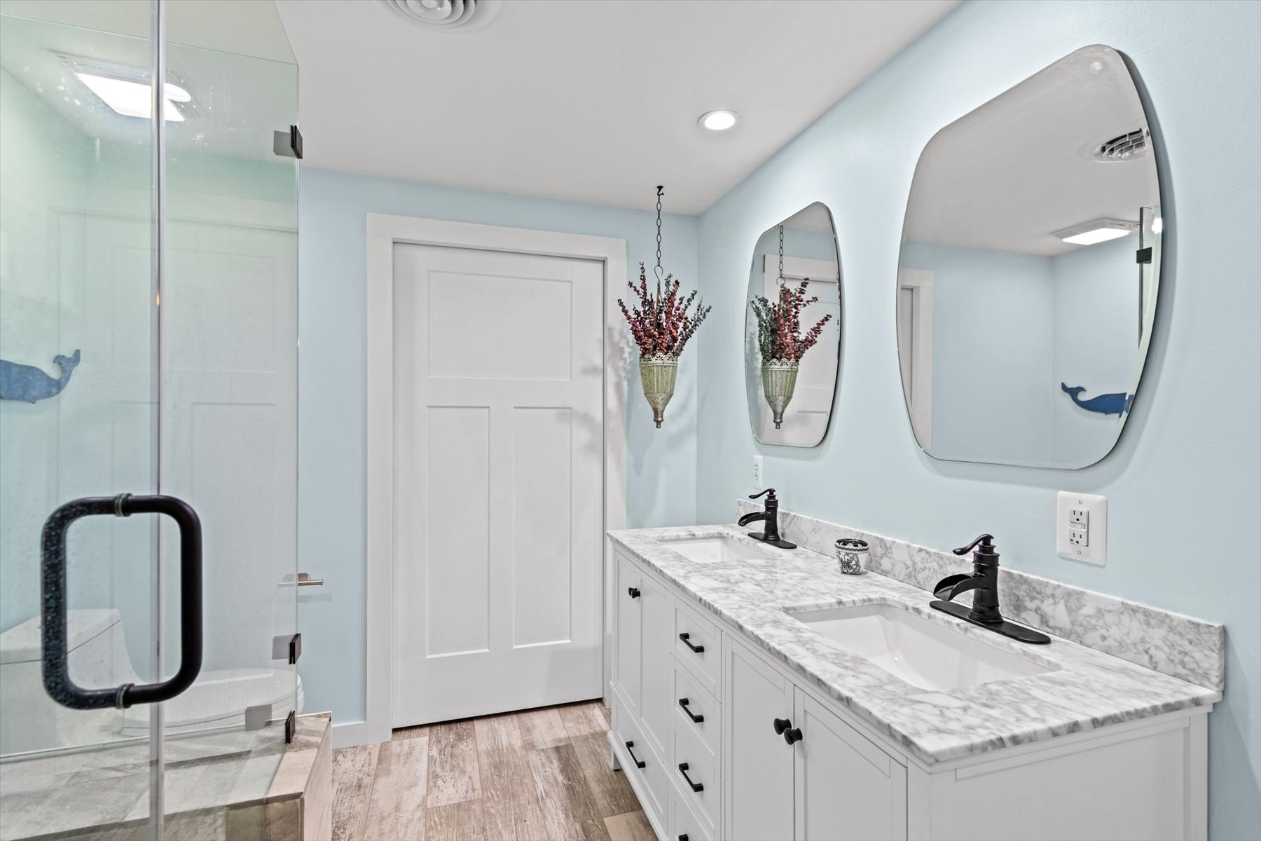 Spa-like Attached Bath with Double Vanity.