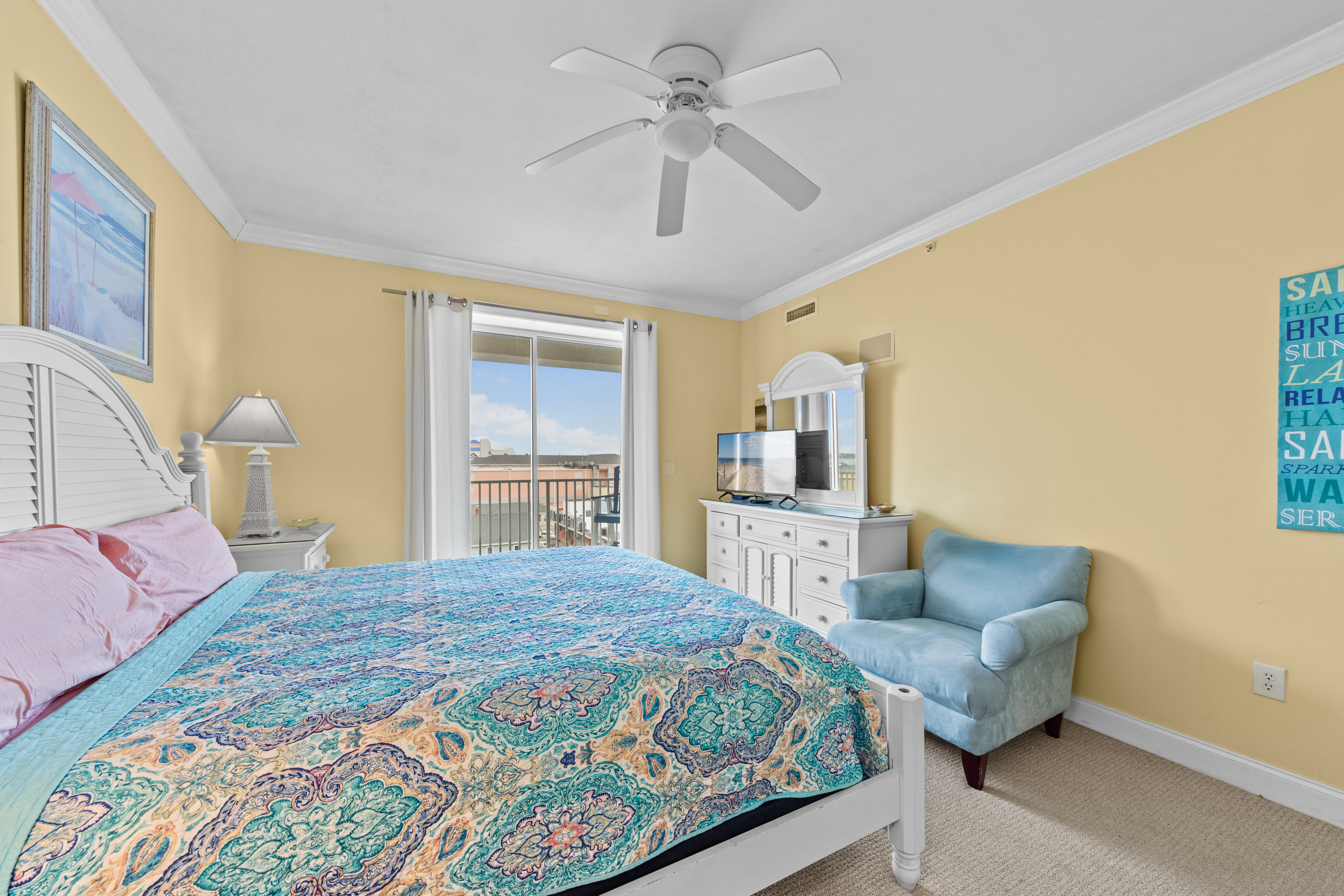 The Primary Bedroom has access to the Private Balcony and a Flat Screen TV.