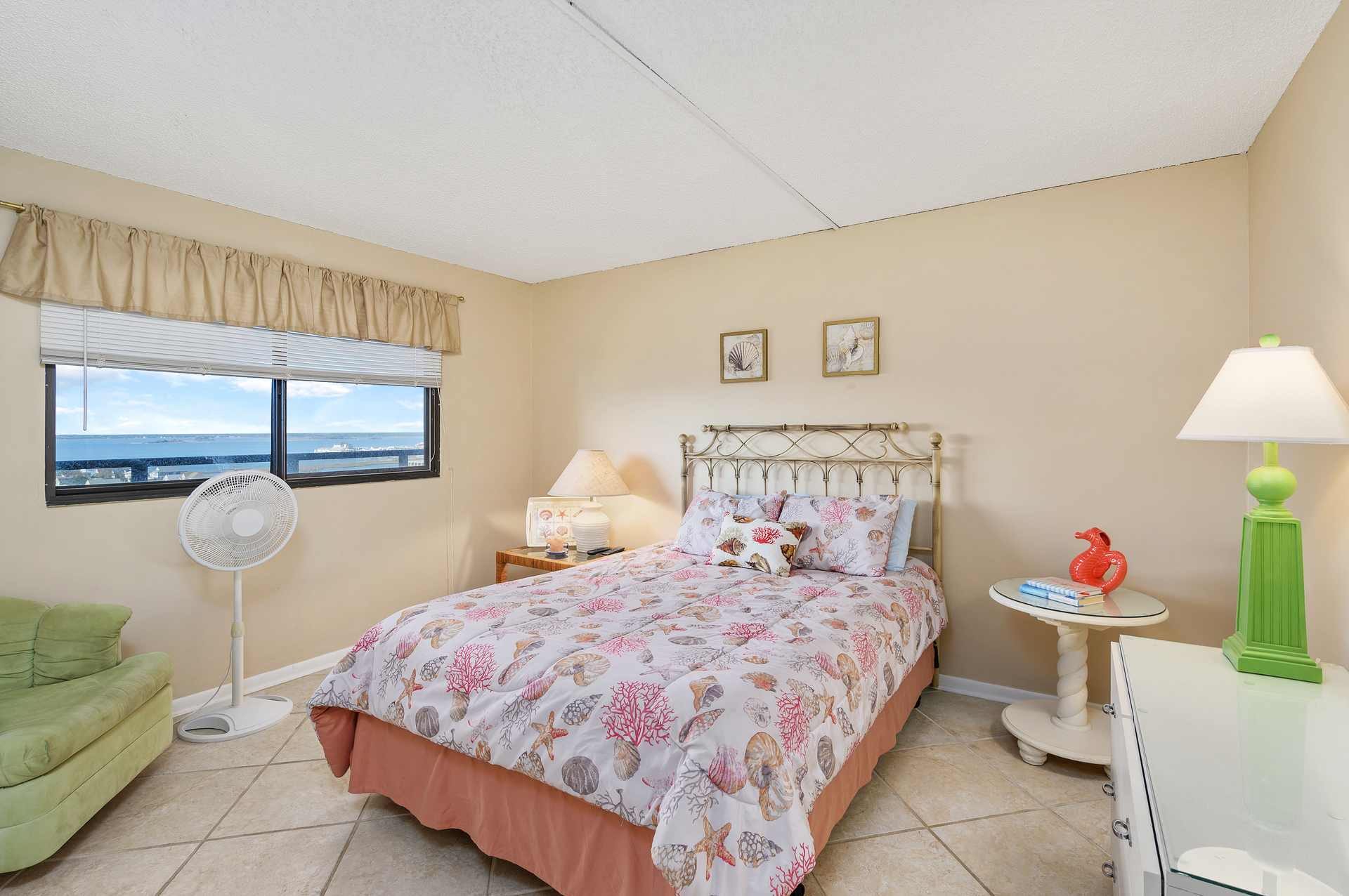 The Bedroom has a plush Queen bed.