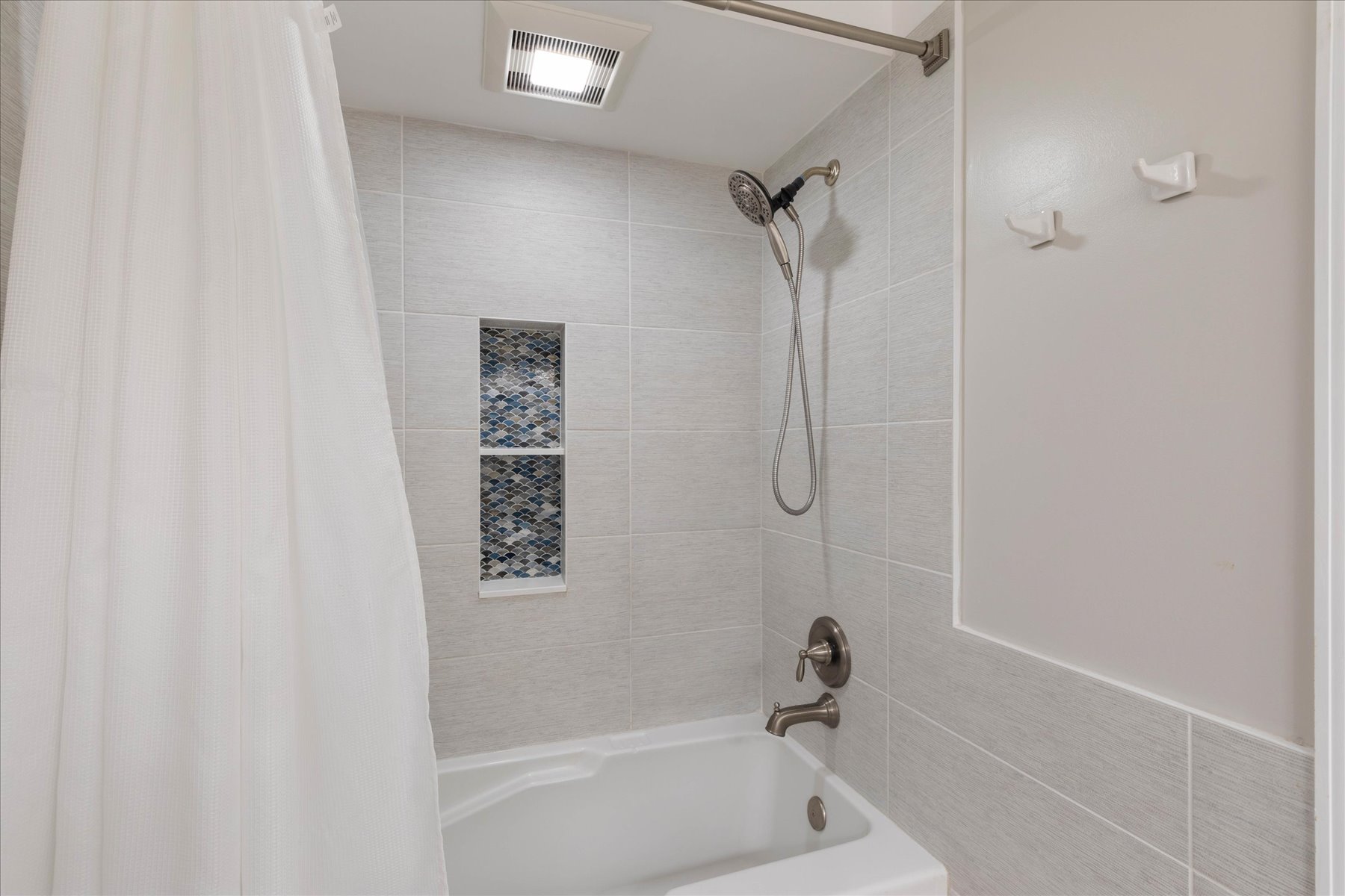 Full bath has a shower/tub combo.