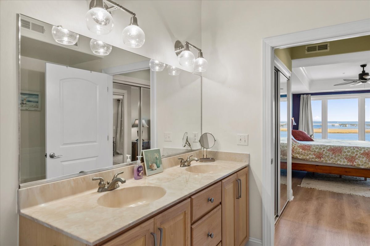 Attached Private Full Bath has a Double Vanity.