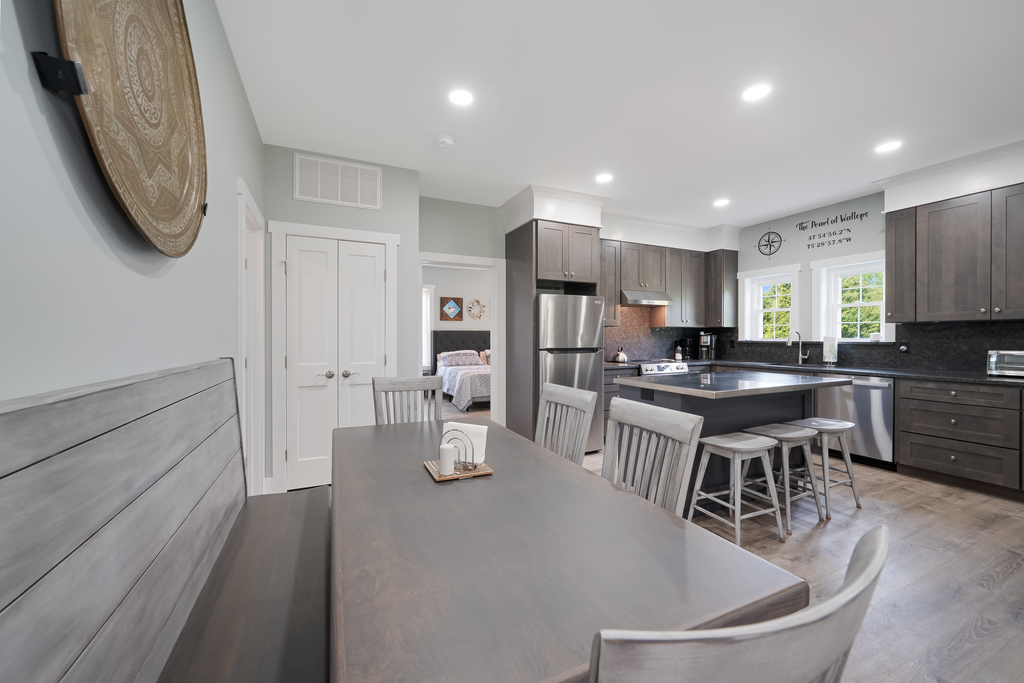Plenty of room for all between the Dining Table and Island.