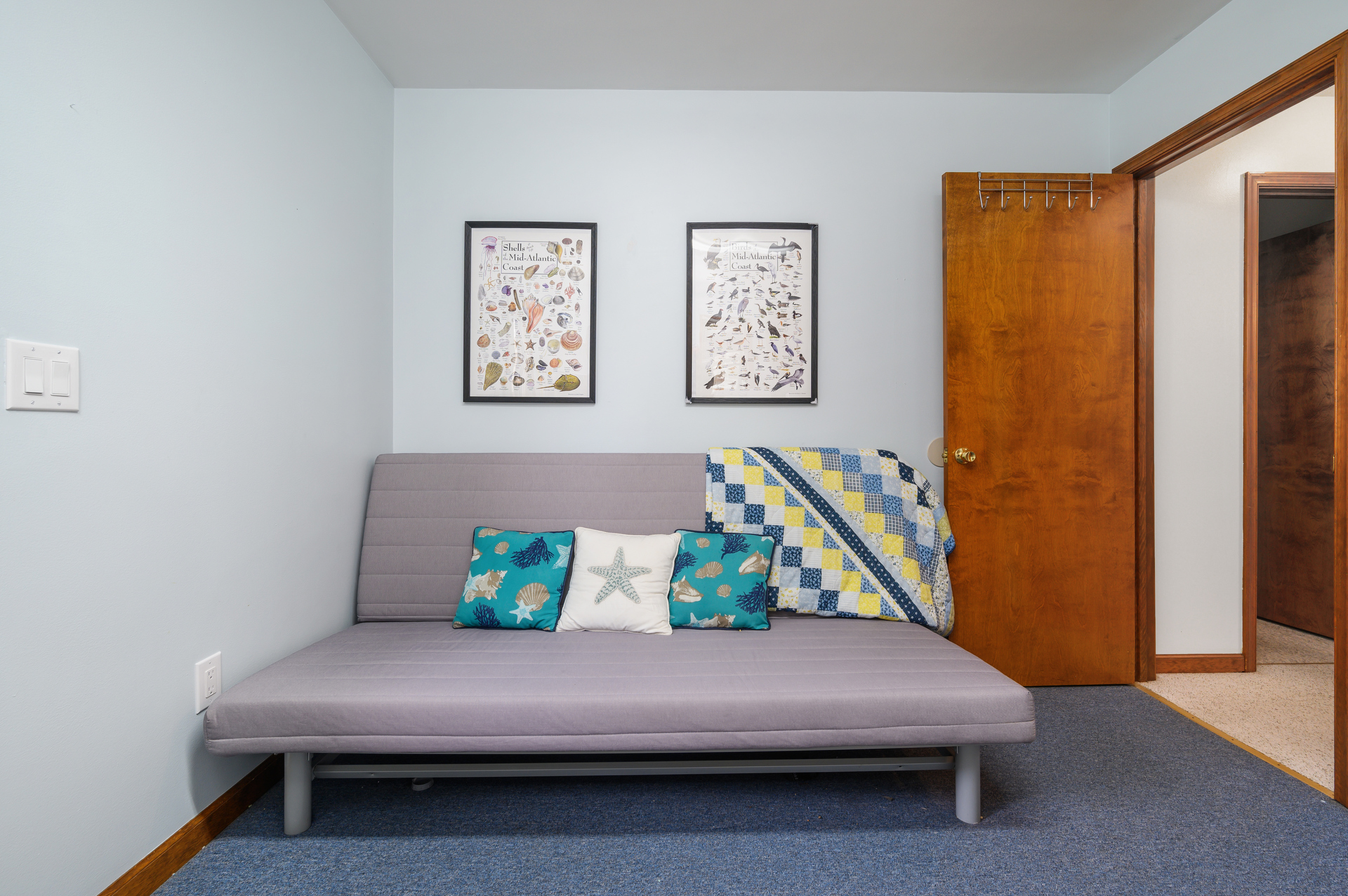 Futon in Laundry Room, just in case you need another bedding option!