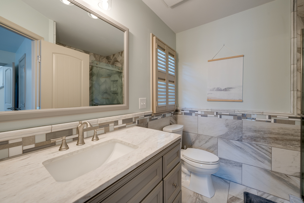 Bedroom 1 has en-suite Full Bath with gorgeous Walk-in Shower.