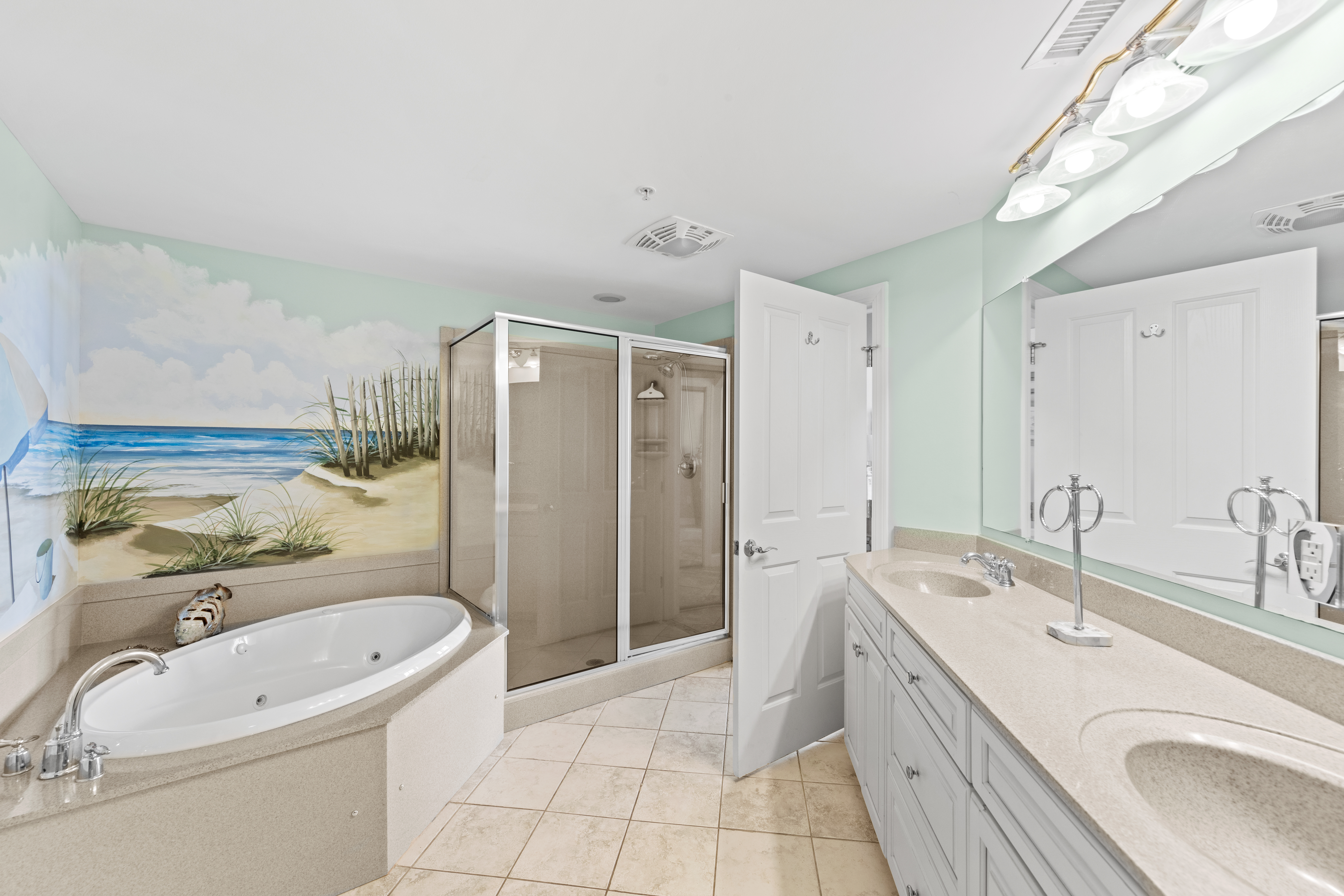 Also a Primary Bath that feels like it’s a Spa experience all its own, with a large soaking tub and oversized Walk-in Shower!