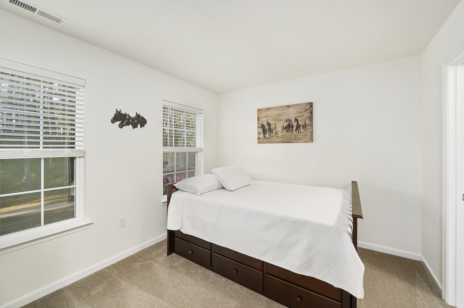 Bedroom 2 has a comfy Full Bed with Twin Trundle.