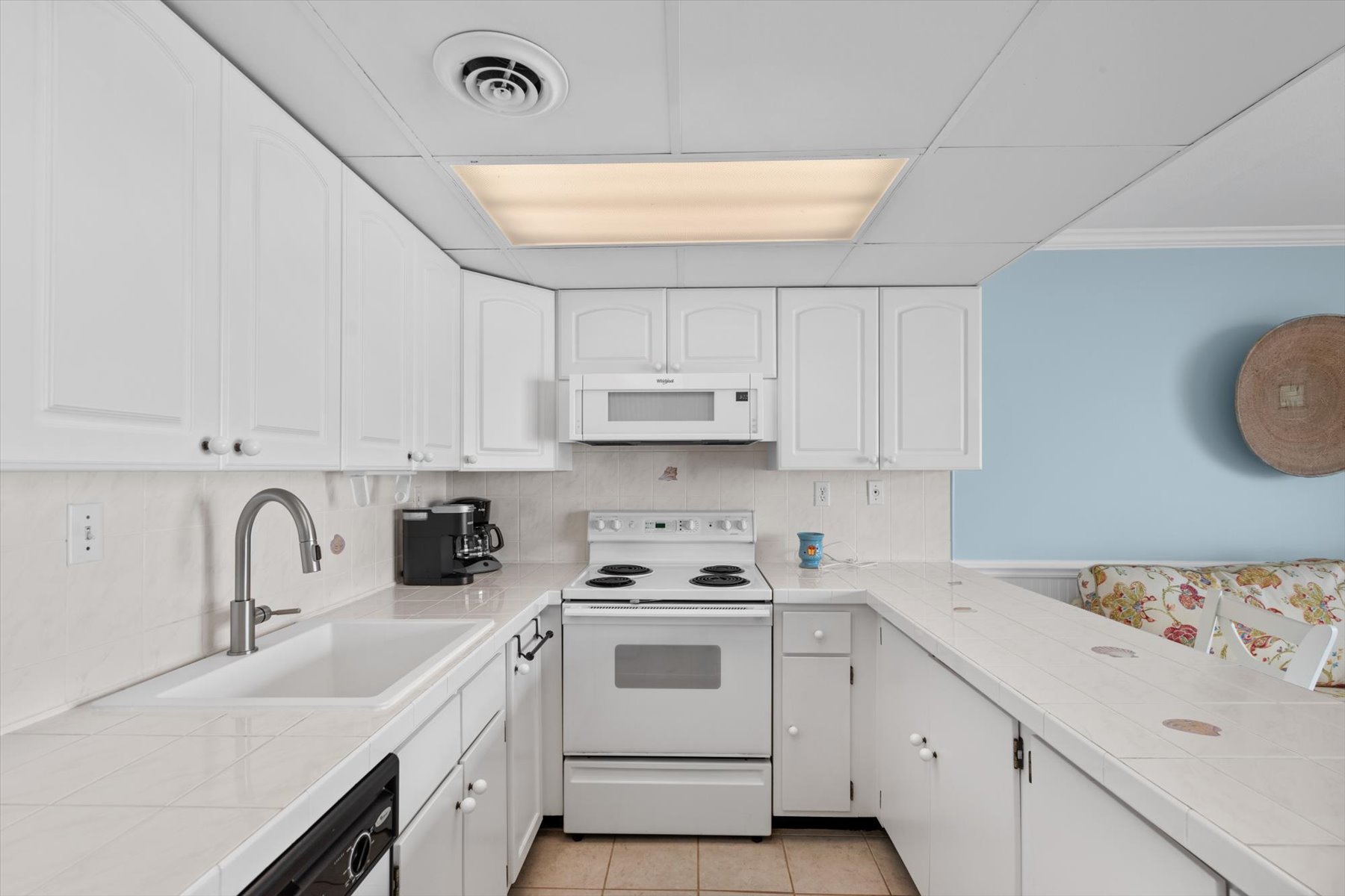 There is plenty of space in the bright and beautiful kitchen