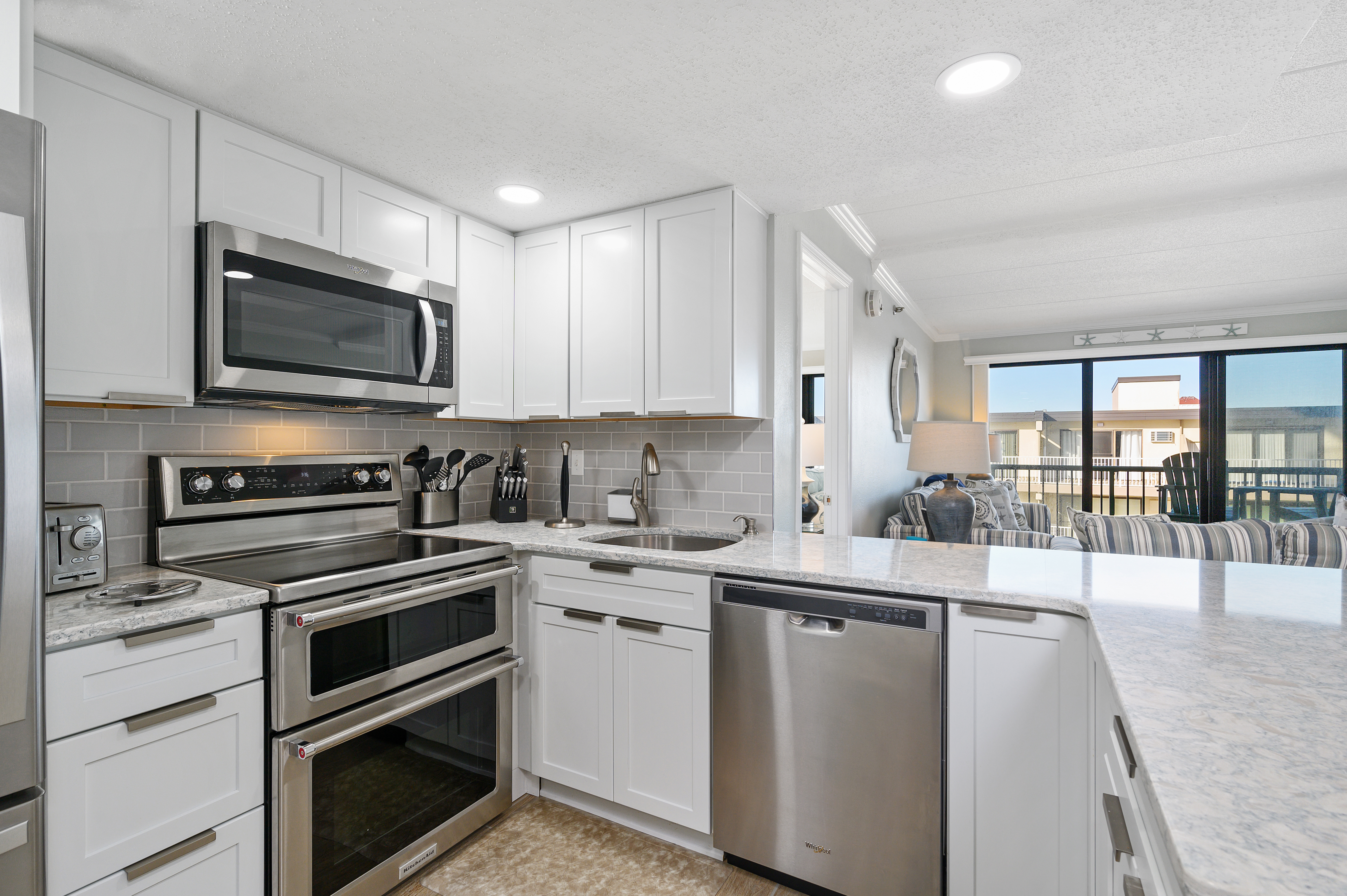 The chef in your family won't mind making meals in this kitchen complete with a double oven and a view!