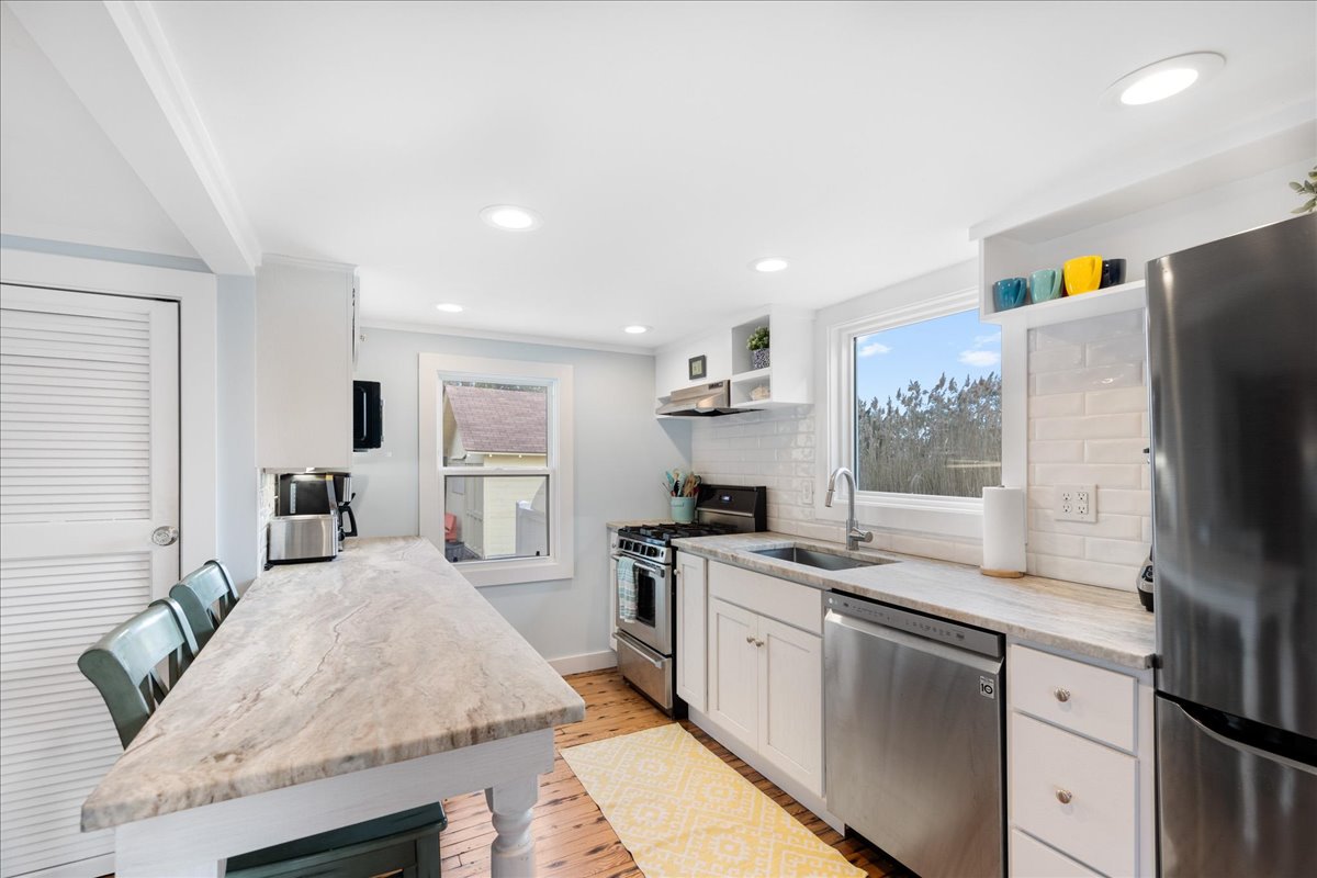 Leathered Granite Countertops and Stainless Appliances.