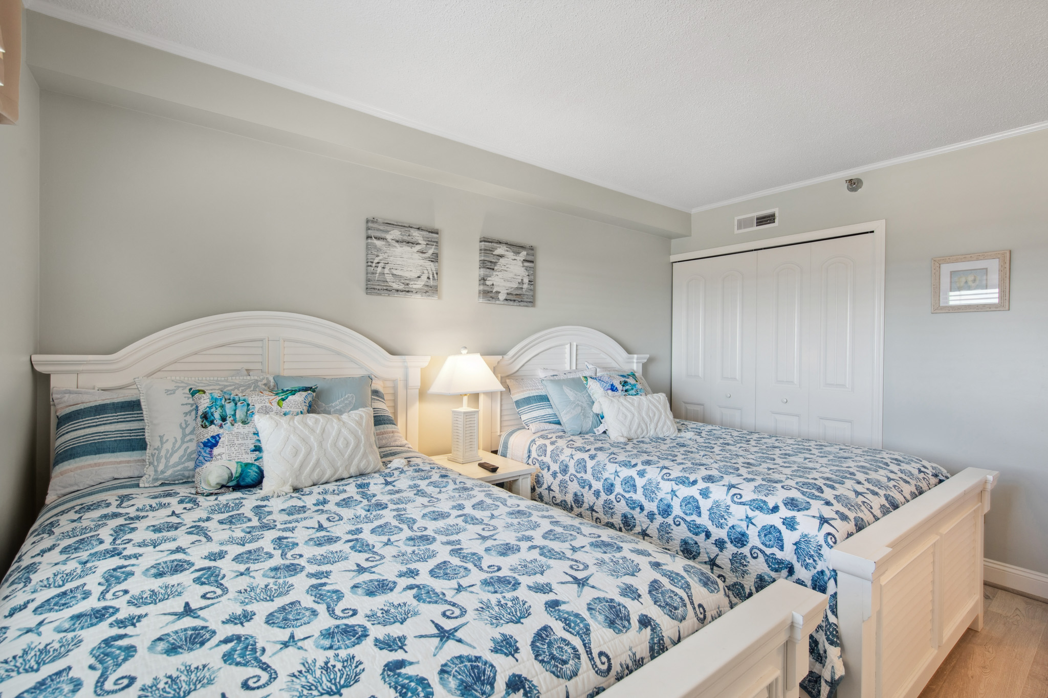 This Bedroom has 2 Plush Queen Beds.