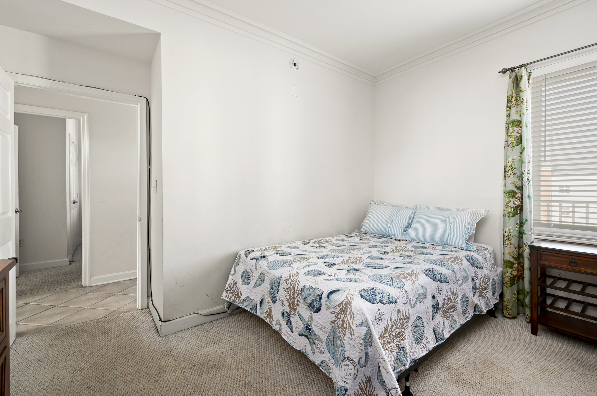 Bedroom 2 is home to a queen bed and 2 bunk beds. Comfortably sleeping 4