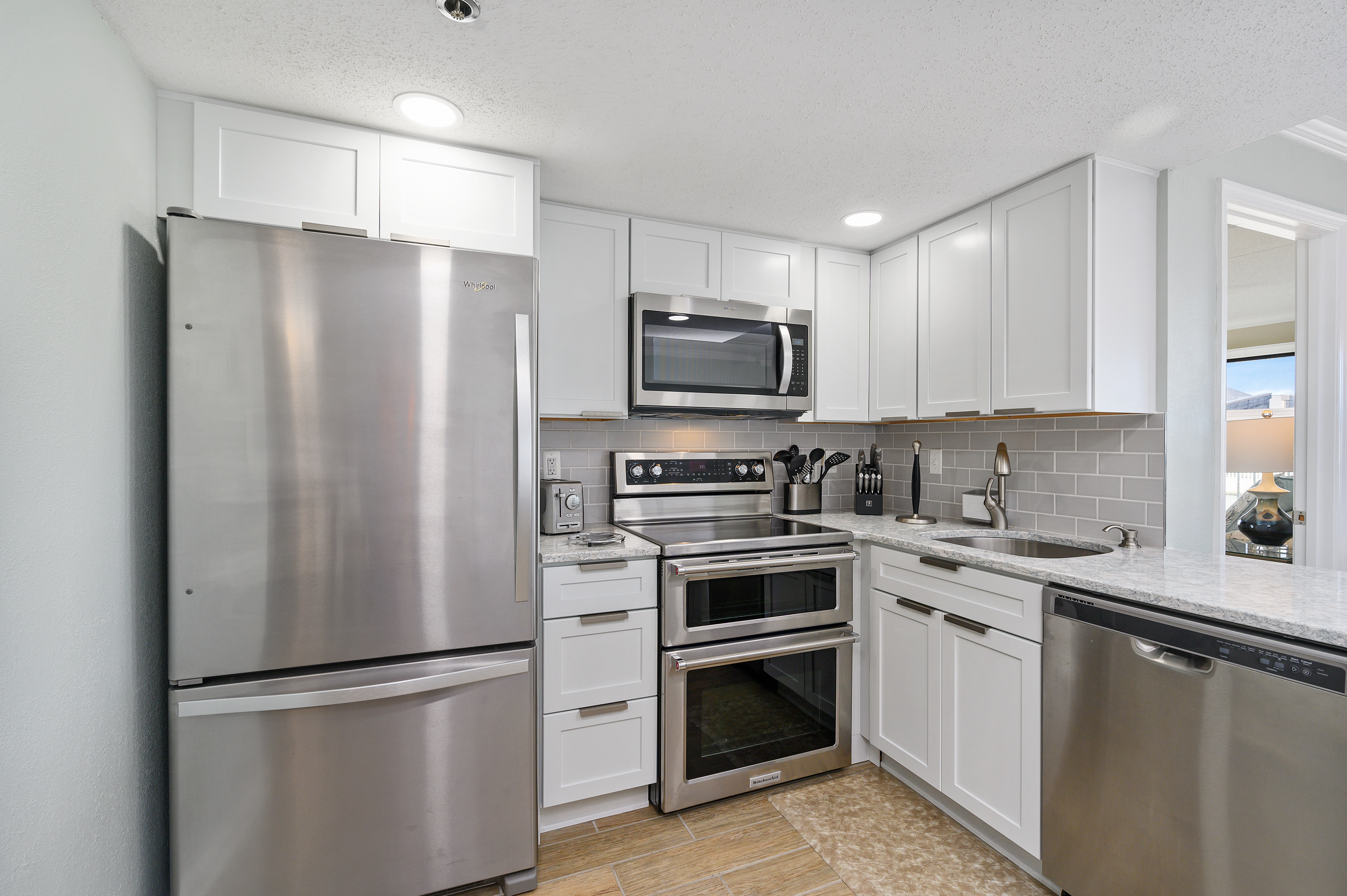 You will have all of the comforts of home and then some with the beautiful stainless appliances and ample counter space