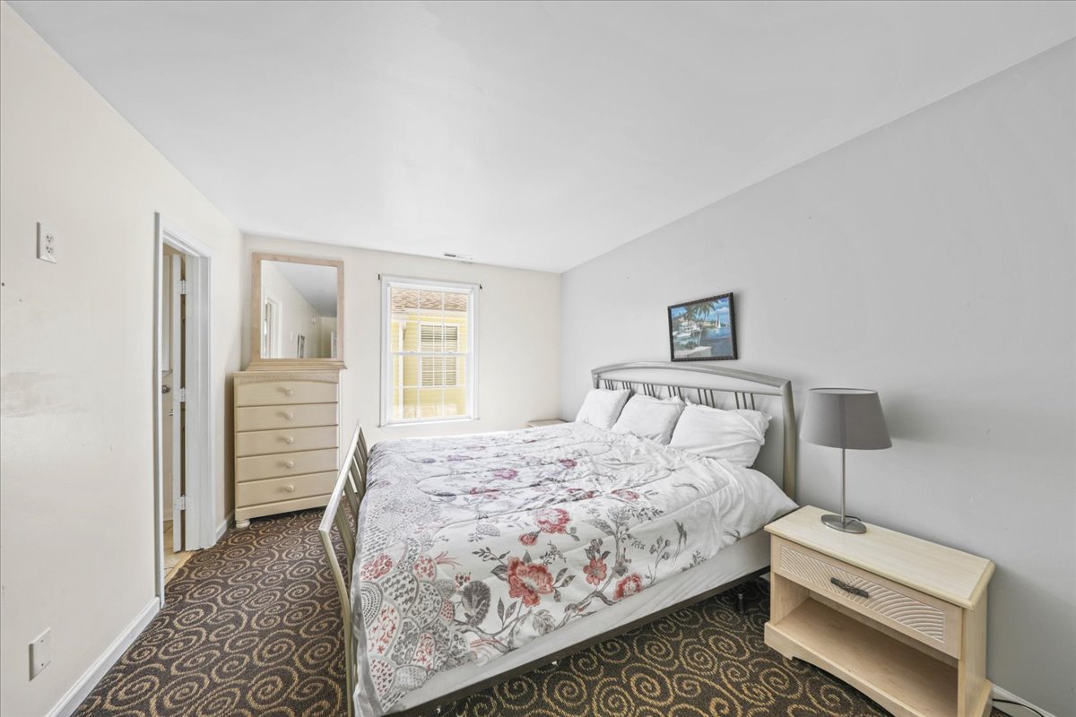 The Primary Bedroom offers a Cozy King Bed!