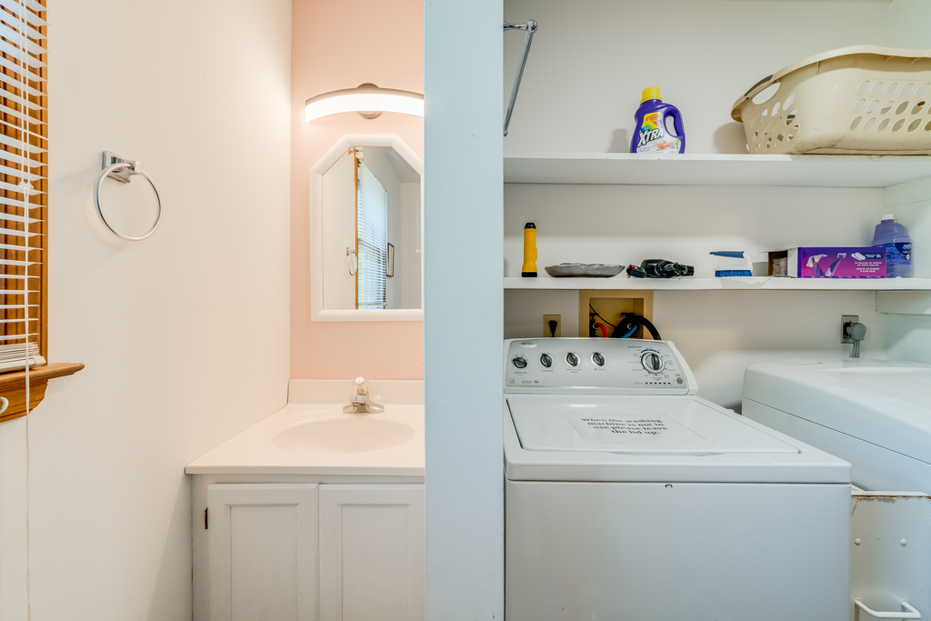 Downstairs Full Bath has Tub/Shower Combo and access to Laundry Area.