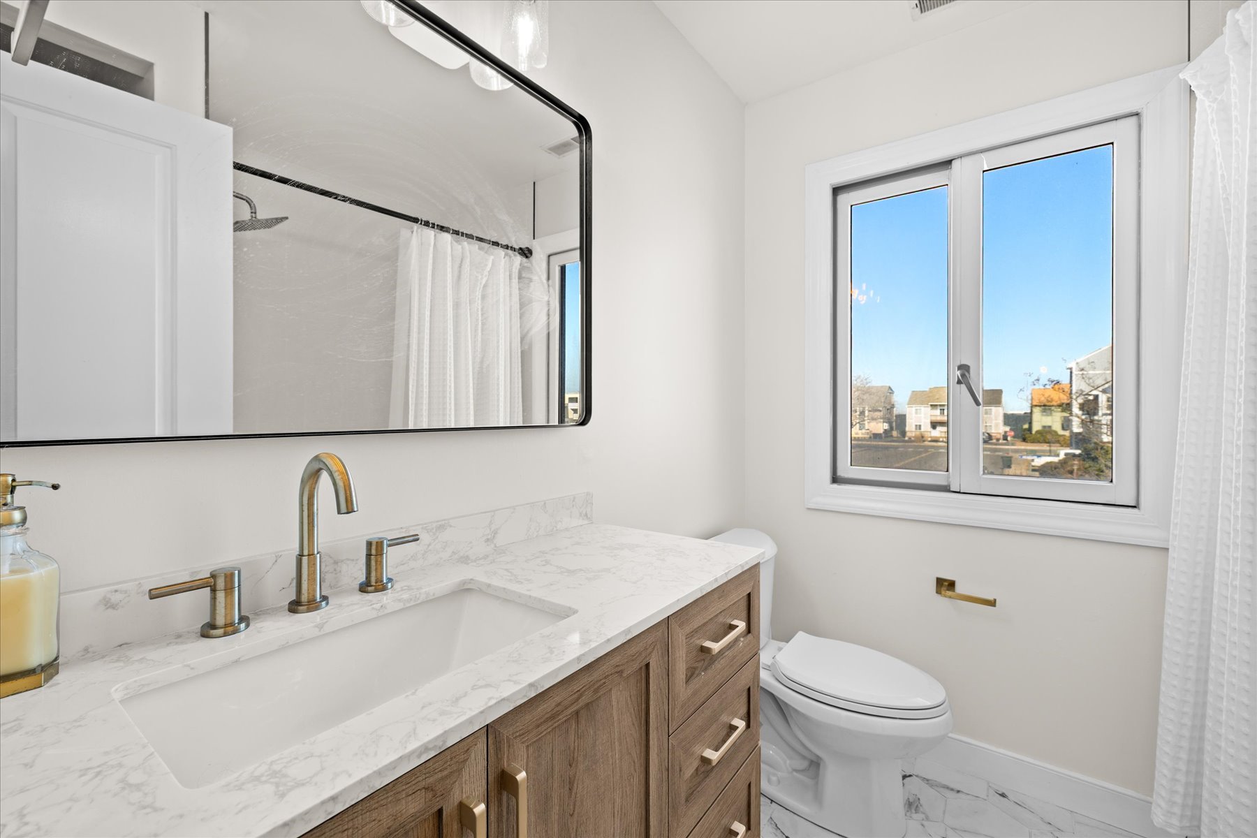 Full Shared Bath with Shower/Tub Combo.