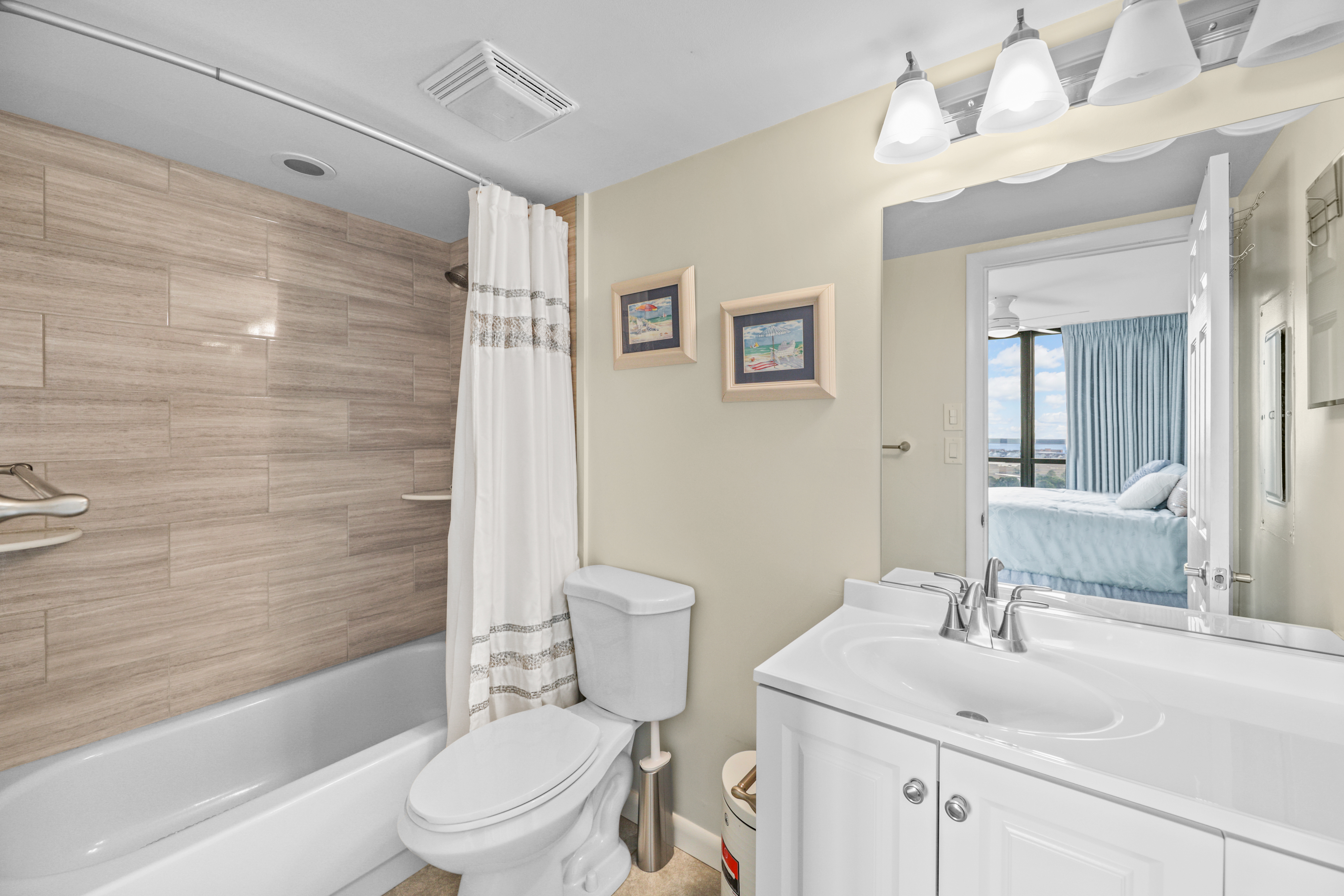 Bedroom 3 has a full size bath featuring tiled shower/tub combo.