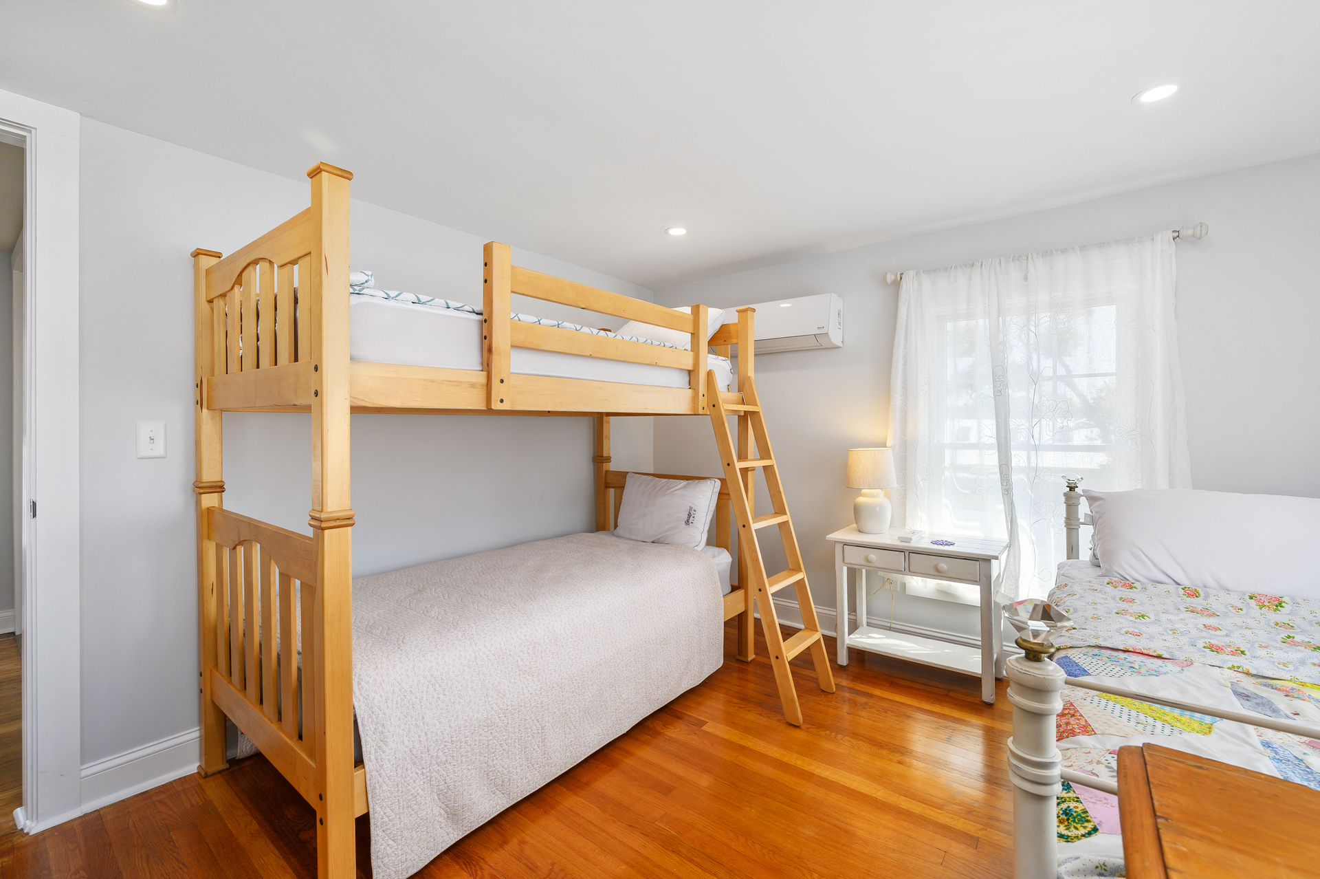 Bedroom 2 sleeps 4 with Twin Bunks and Twin Bed with Twin Trundle.