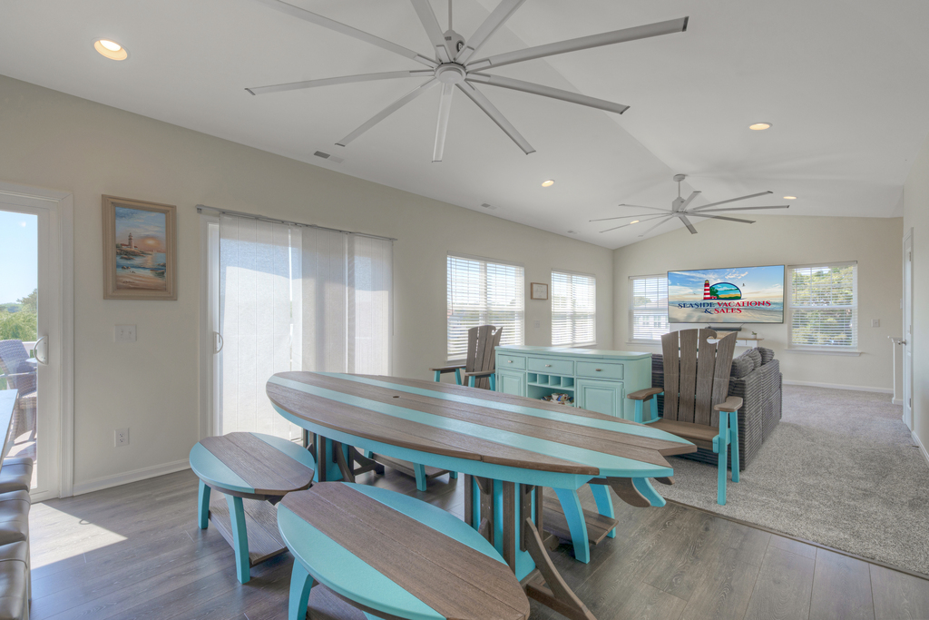 Dine in the comfort of the AC at the large Farmhouse Dining Table.
