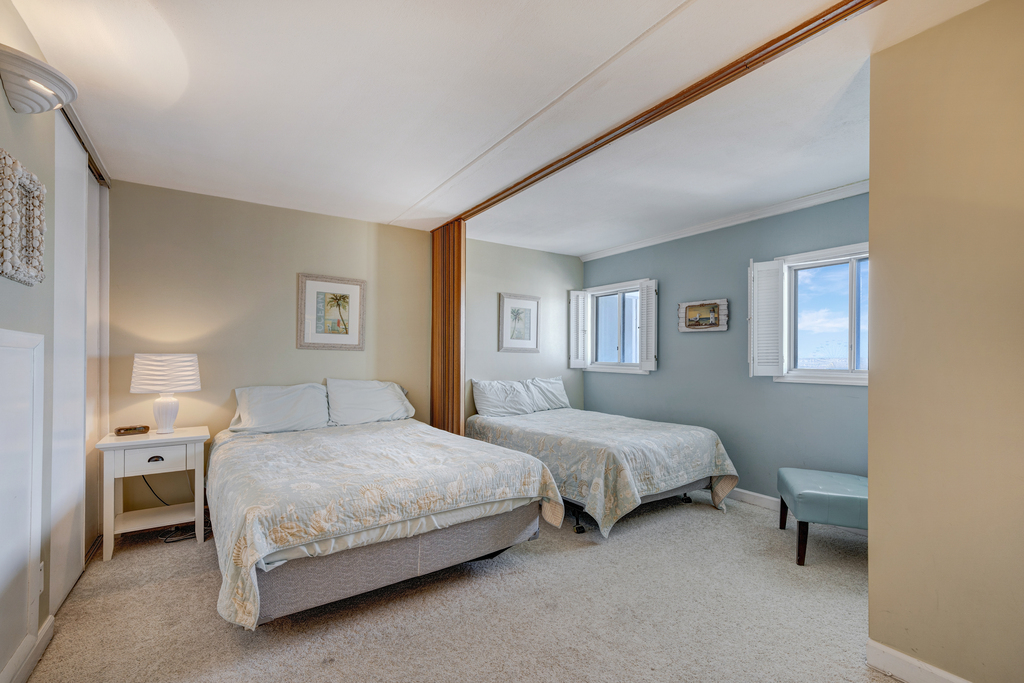 The Bedroom offers 2 Plush Queen Beds.