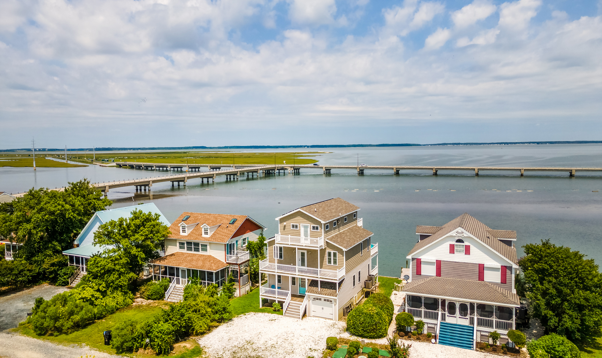 This gorgeous Home overlooks the Bay, the Chincoteague Causeway, and Oyster Beds.