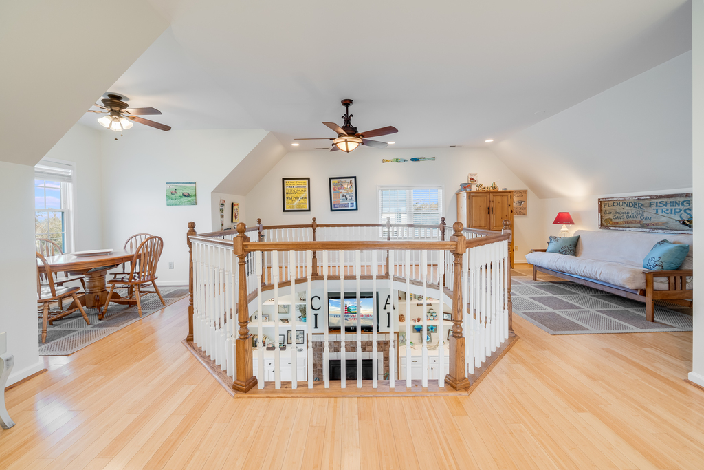 Wandering upstairs, you'll find a super cool Loft area with Sitting Area and the Primary Bedroom Suite.