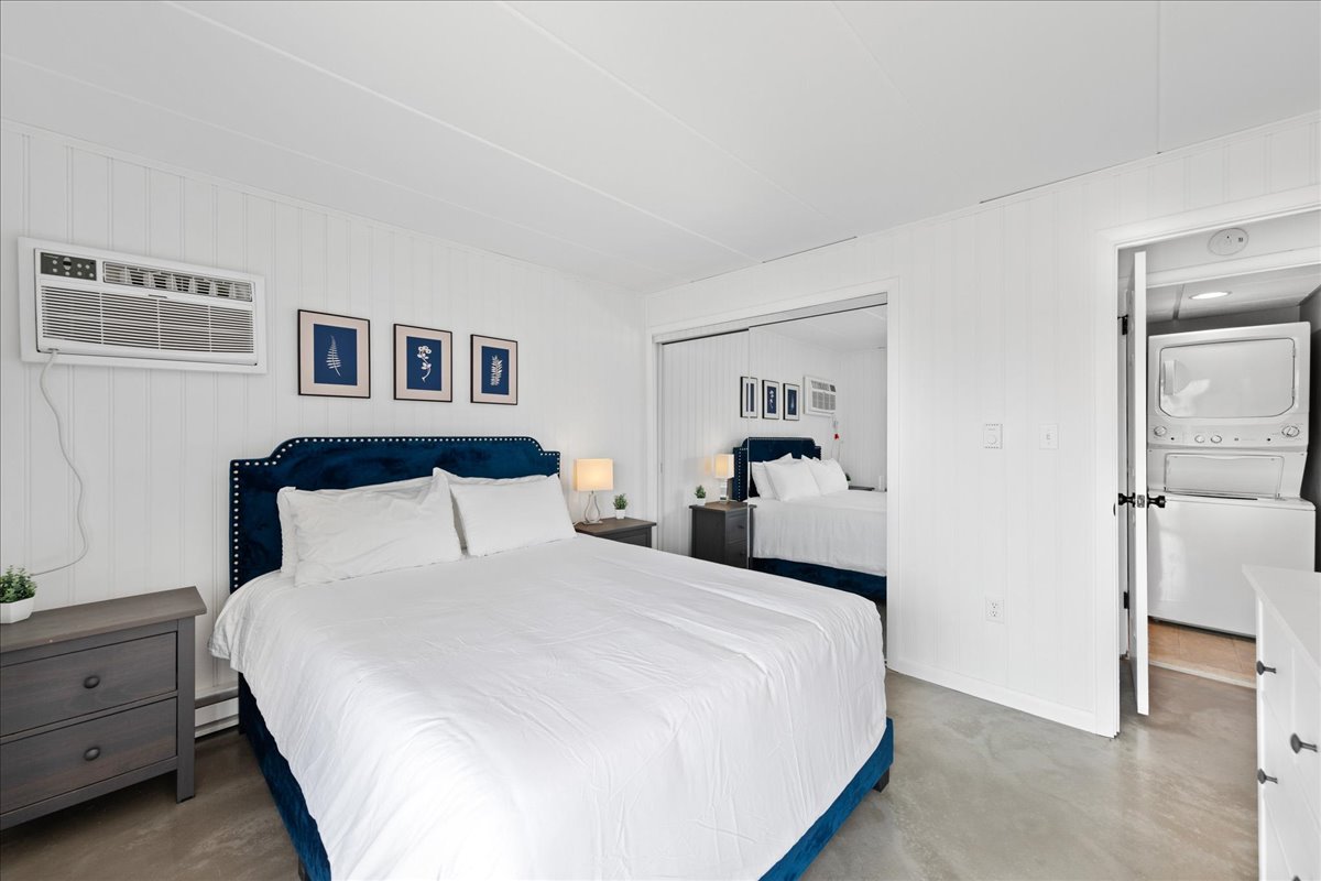 Bright & Beachy with a Cozy Queen Bed.