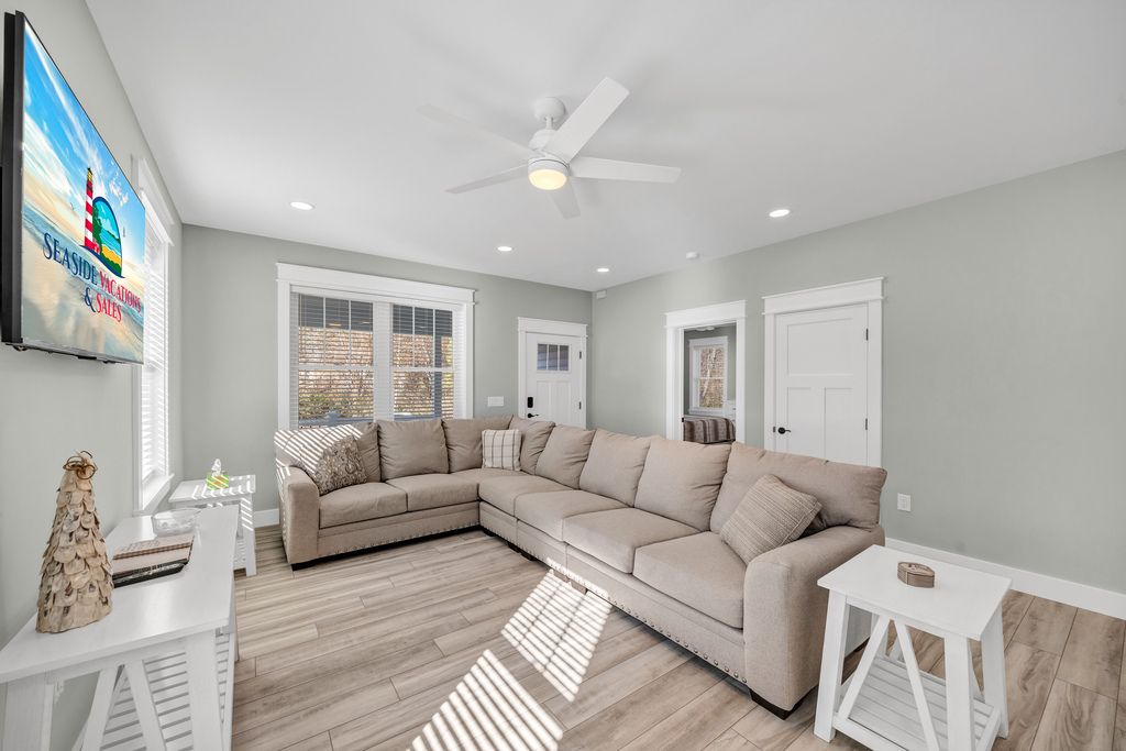 Spacious Living Area with high-end comfortable furnishings.