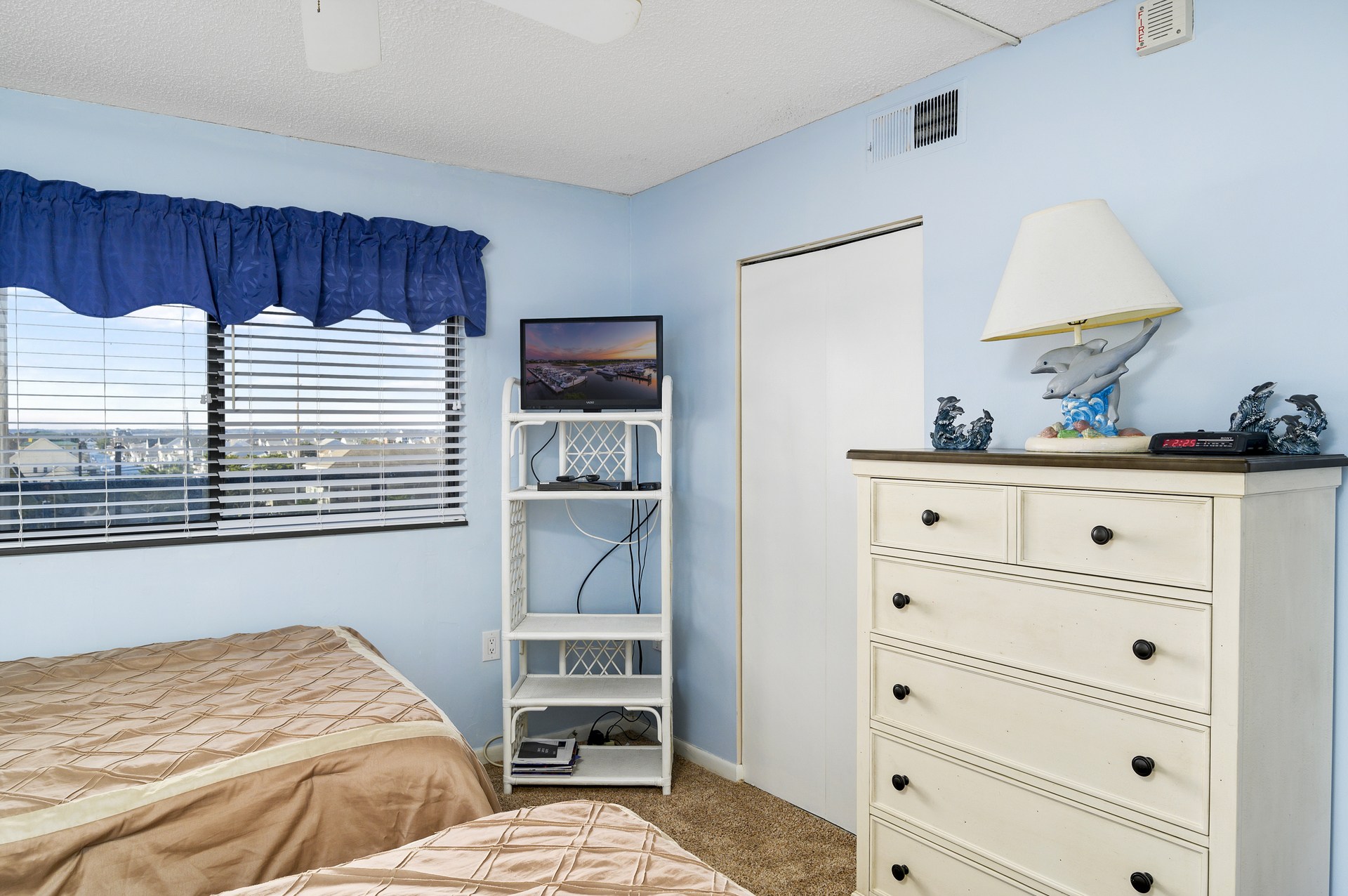 Sink into bed & catch up on your favorite shows on the Flat Screen TV.