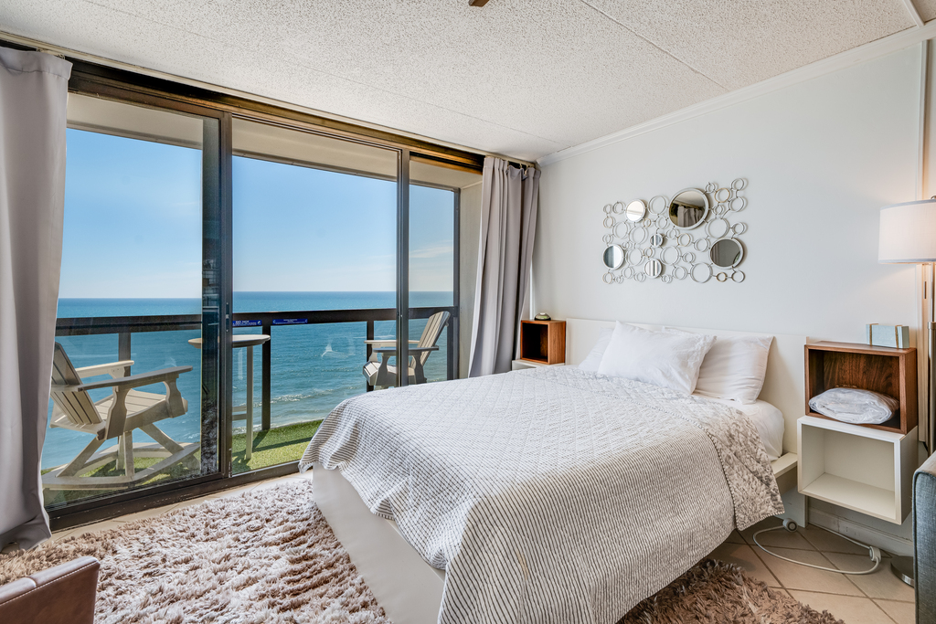 Sink into bed for a cozy nights sleep in the Plush Queen Bed.
