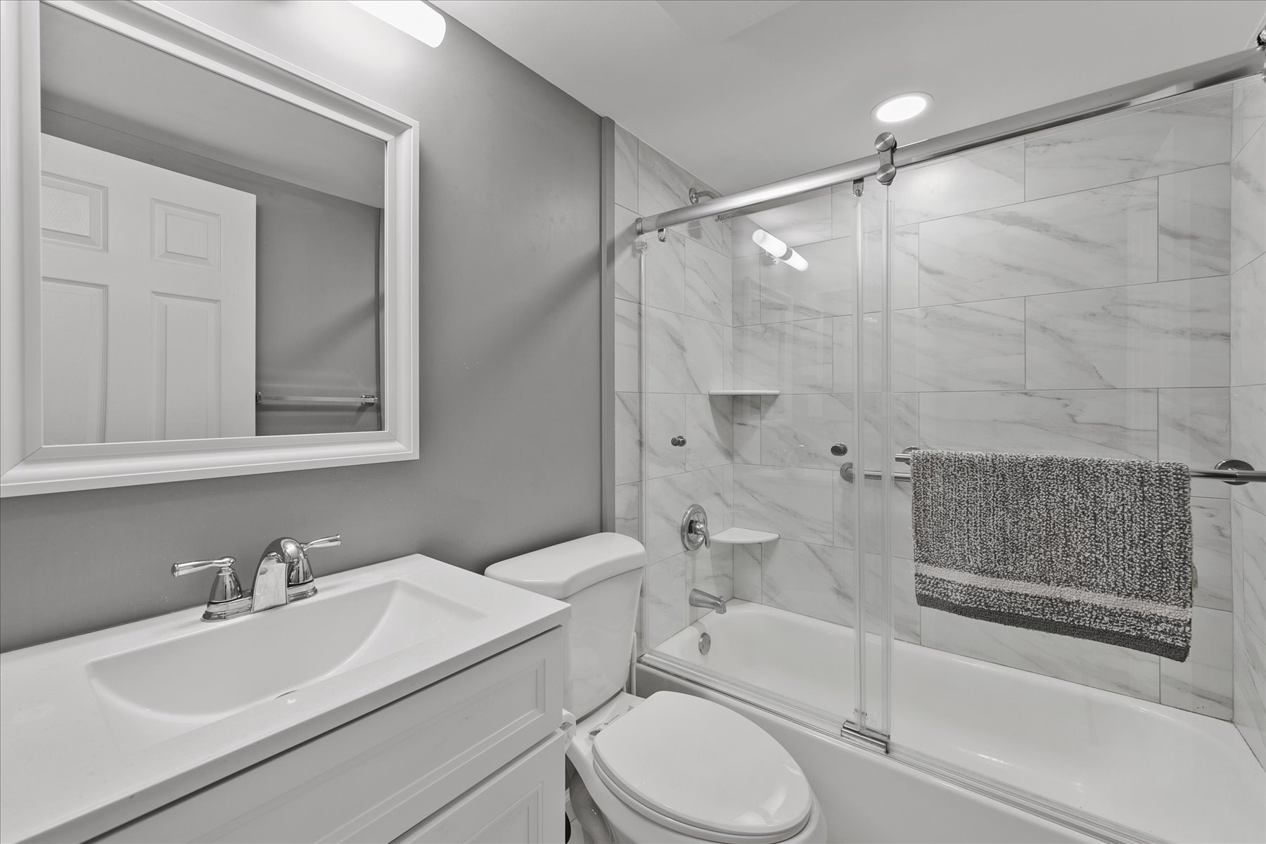 Second Shared Bath complete with a renovated Shower/Tub Combo!