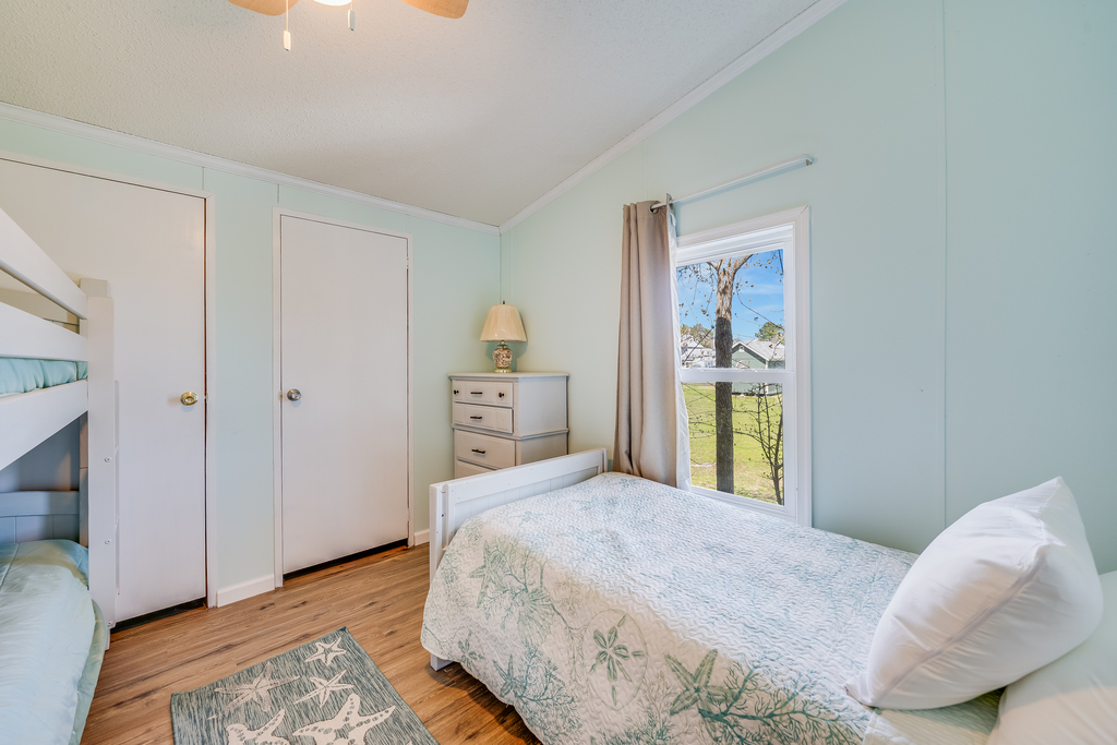 Bedroom 2 has 3 Twin Beds.