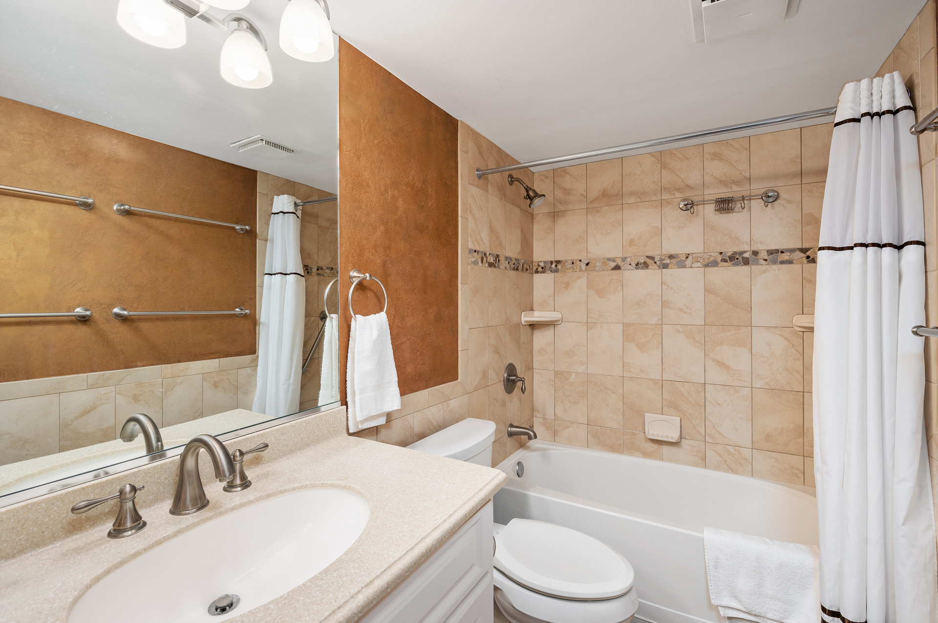 Gorgeous, Custom Tile Shower/Tub Combo in the Shared Full Bathroom.