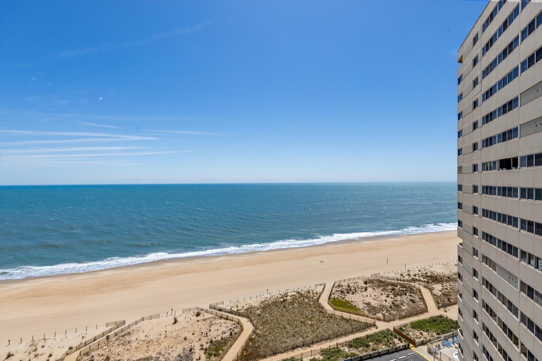 Take in the breathtaking expanses of the sand and rolling blue waves stretching down the coast.