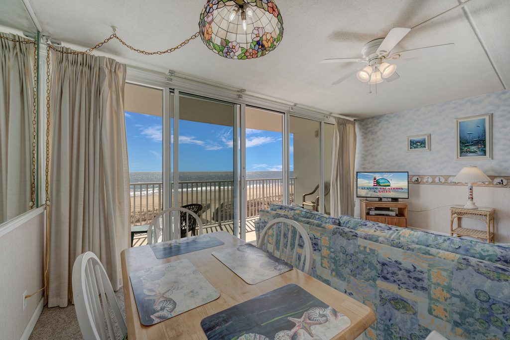 A stylish Living space with a breathtaking ocean backdrop.