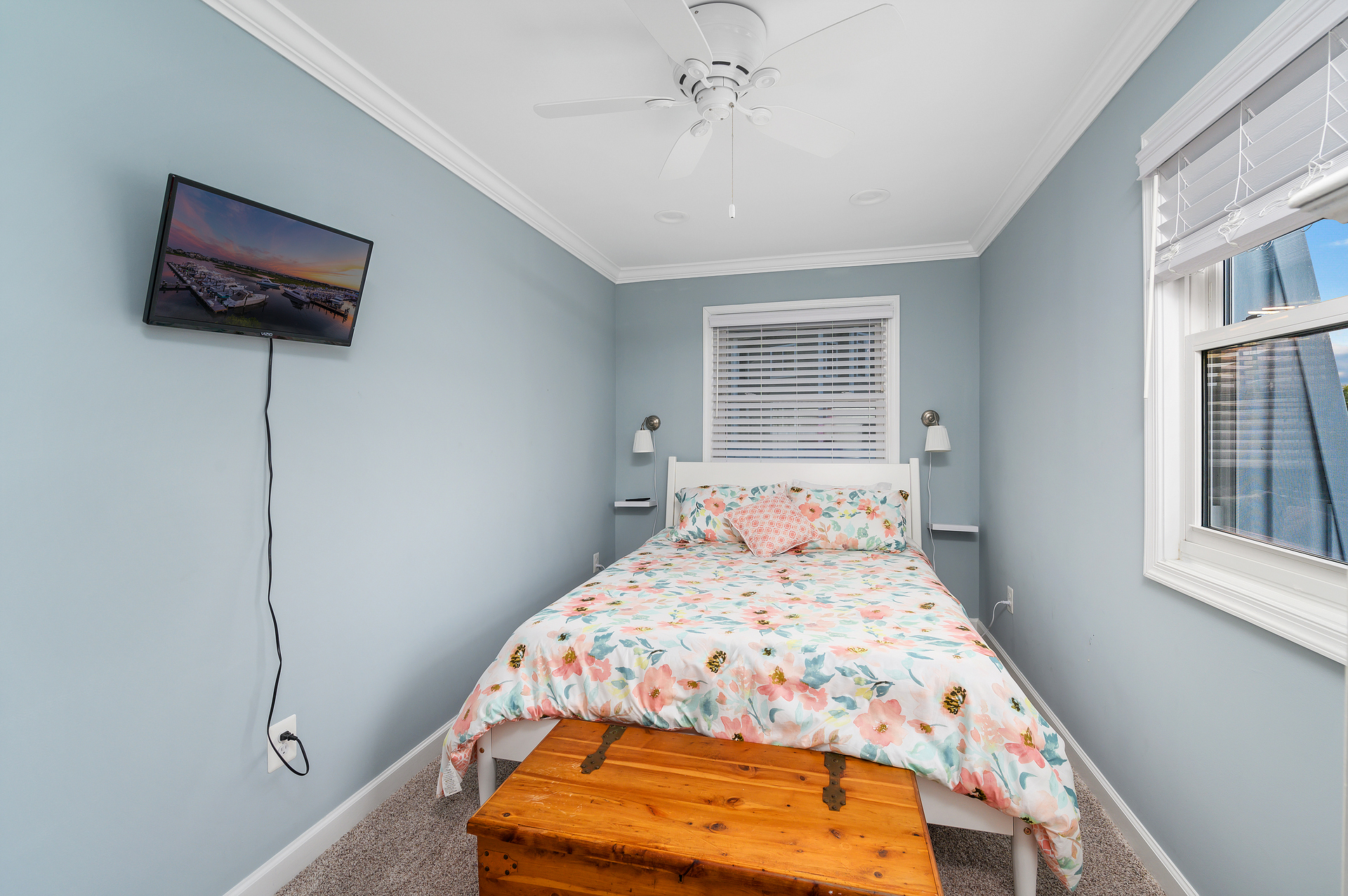 Bedroom 3 has a cozy Queen bed and flat screen TV.