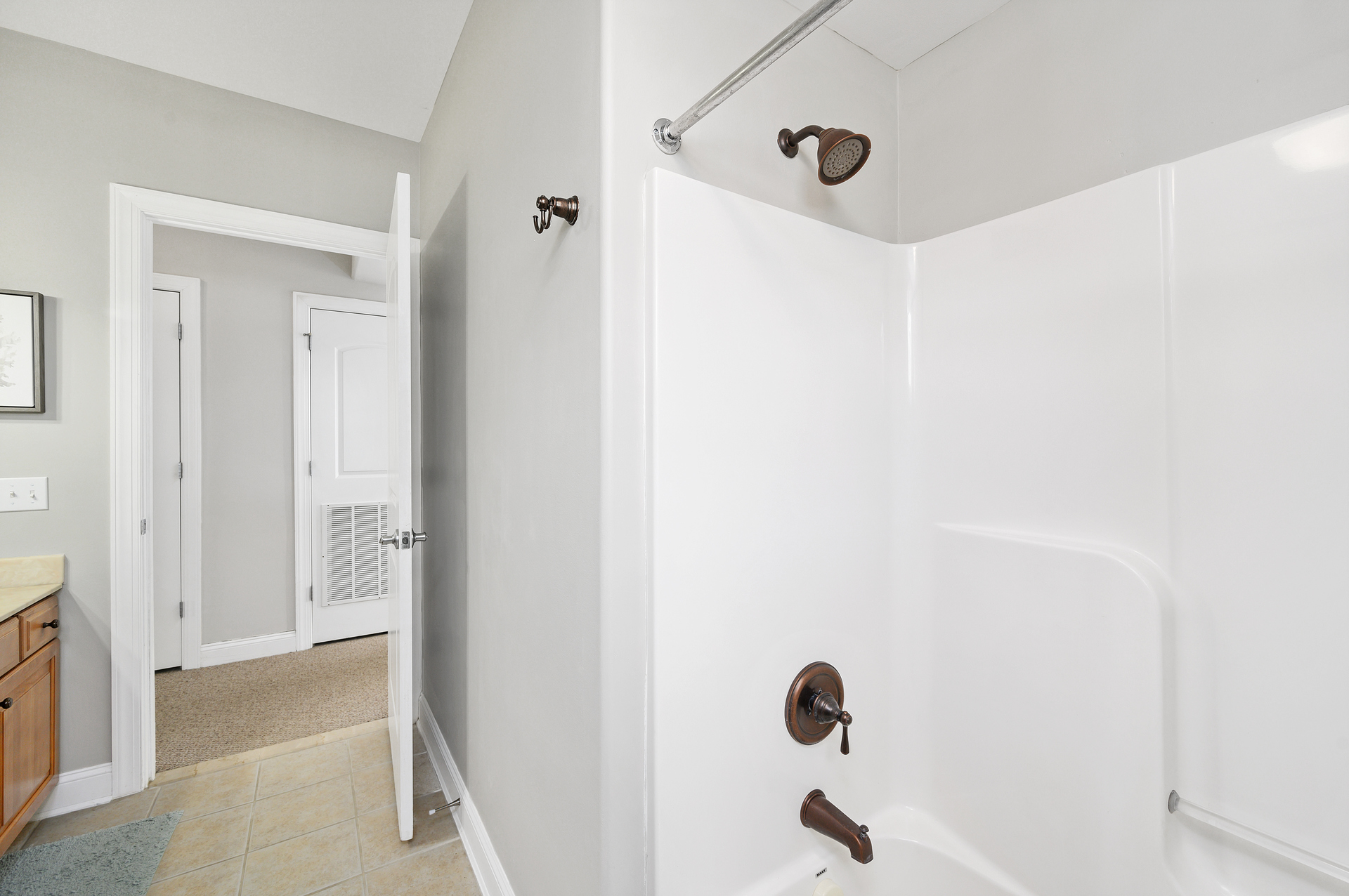 Shared Full Bath has Tub/Shower Combo.