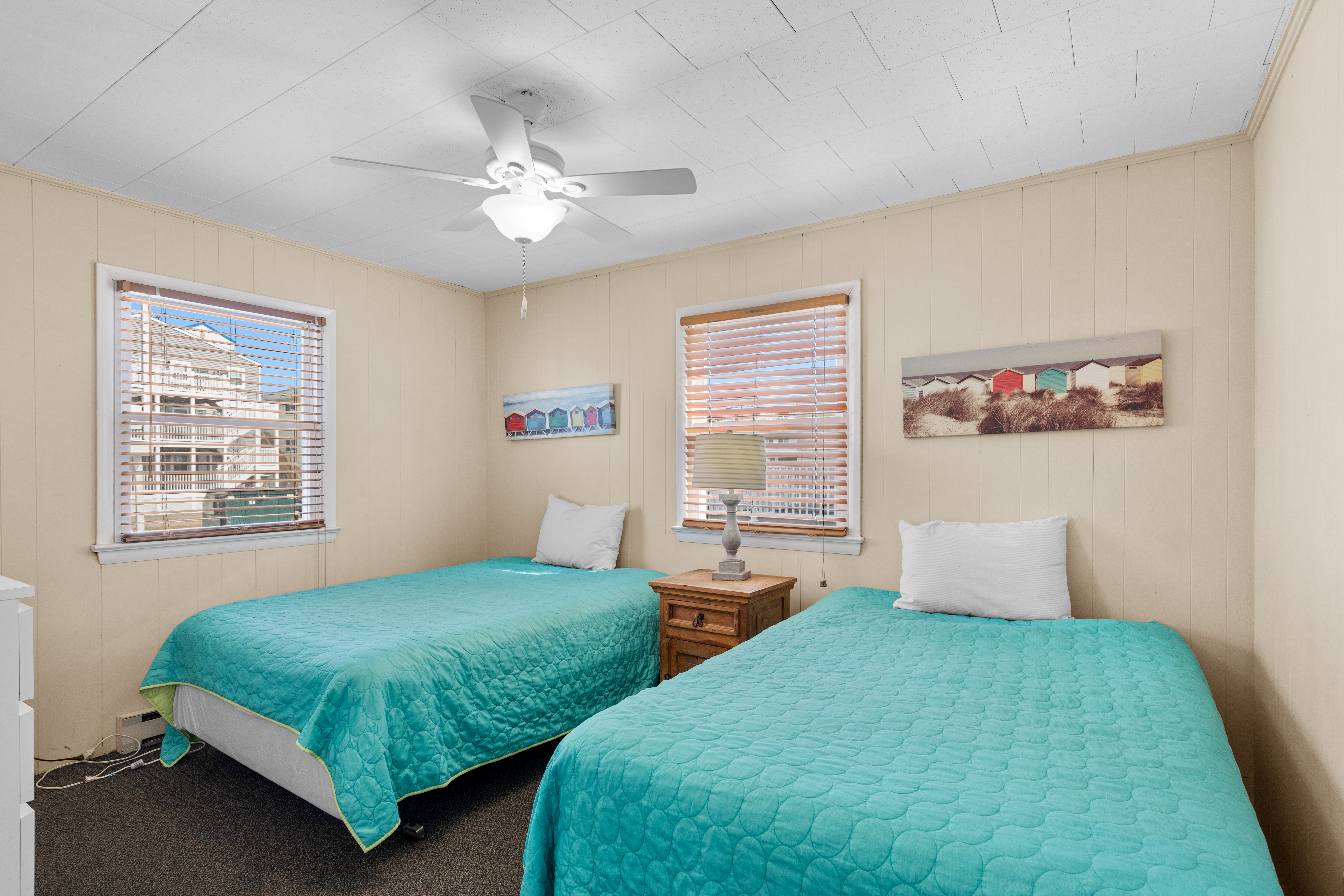 Next door is Bedroom 3 with 2 more Double Beds.