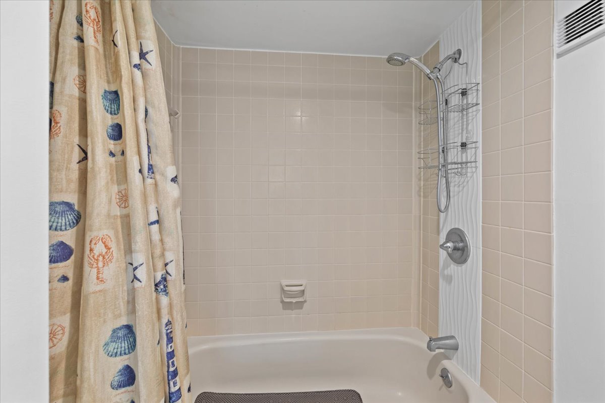 Freshen Up in the Spacious Shower/Tub Combo.