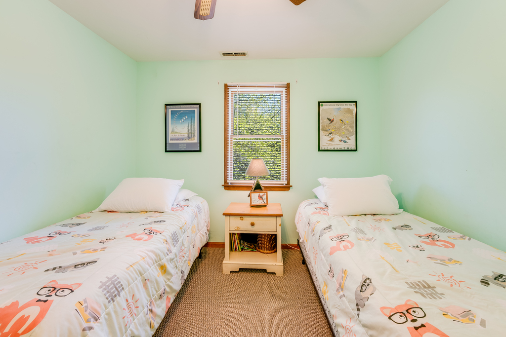 Also downstairs is Bedroom 2 with 2 Twins and a fun Lighthouse Theme.