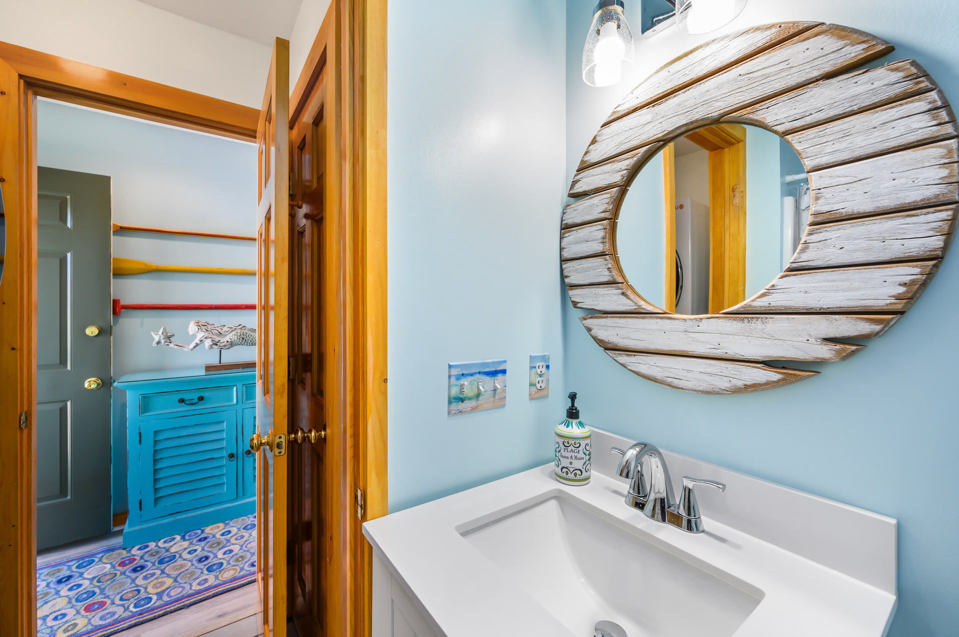 Full Bath 2, just off the Hall, has a Walk-in Shower.