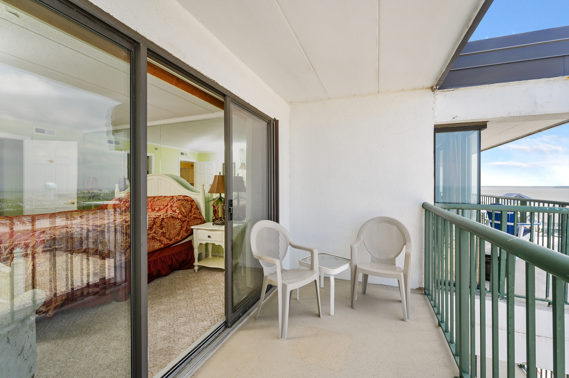 Slip out the Primary Bedroom Slider and enjoy watching the stars with your favorite glass of wine