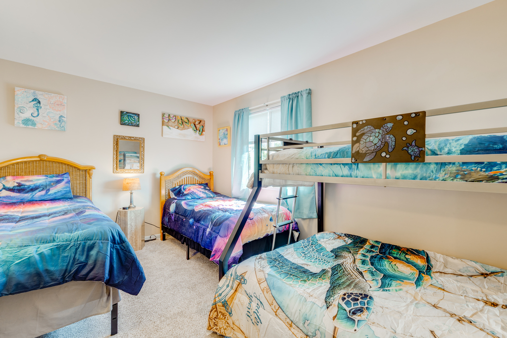 The kiddos will adore Bedroom 3 with a Pyramid Bunk and 2 Twin Beds.