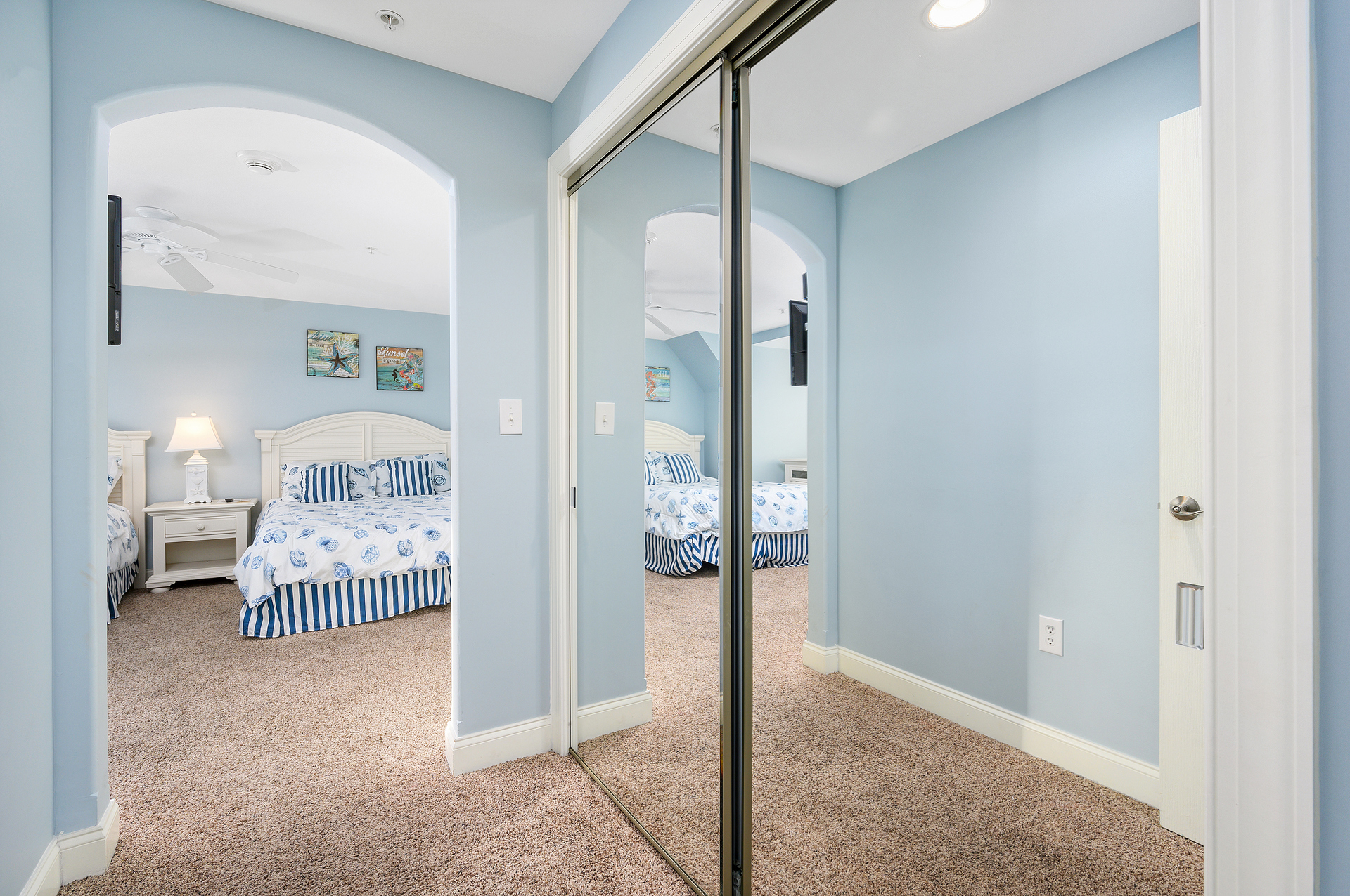 Large Mirrored doors just add to the Brightness of this beautiful room